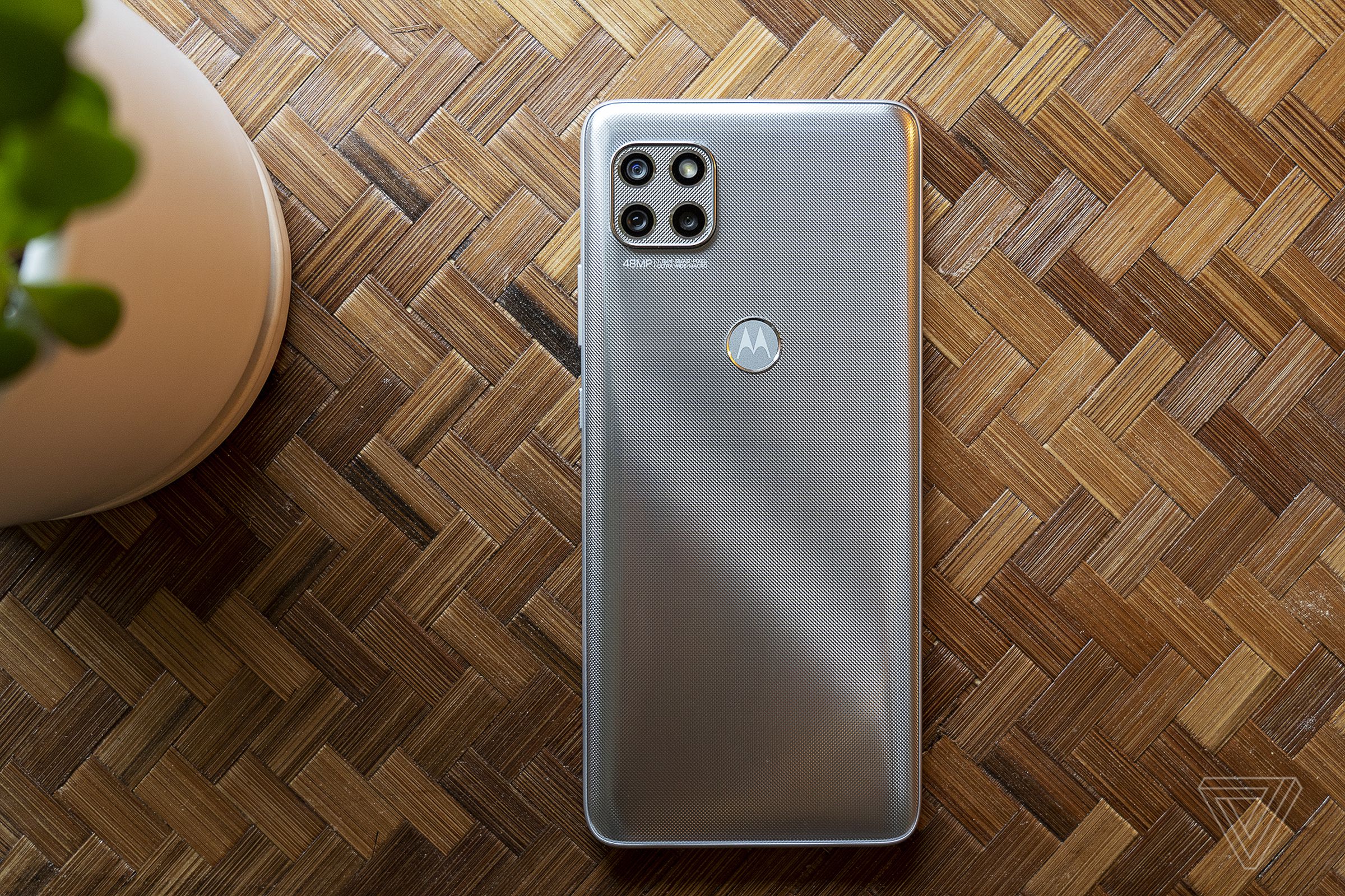 The rear camera bump includes a wide, ultrawide, macro, and a flash.