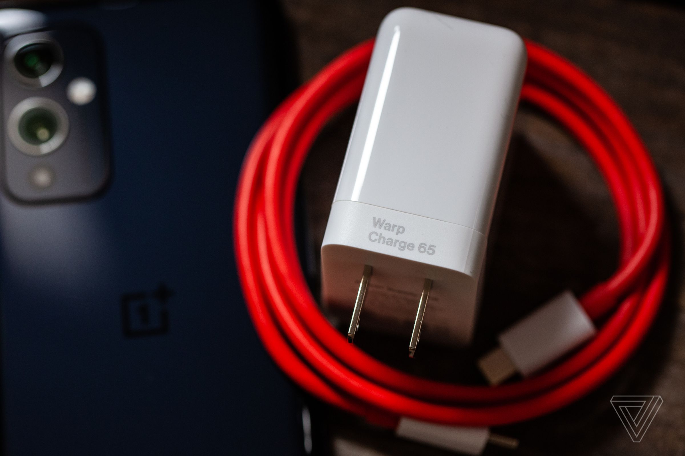 The 65W charger comes in the box (pictured with the regular OnePlus 9).