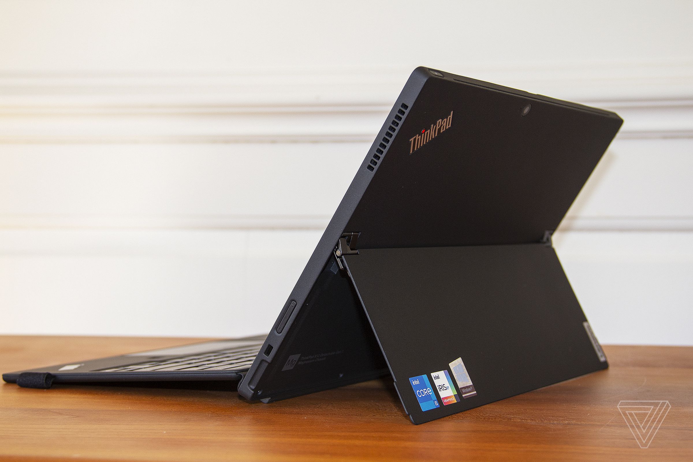 The ThinkPad X12 Detachable seen from the back, angled to the left.
