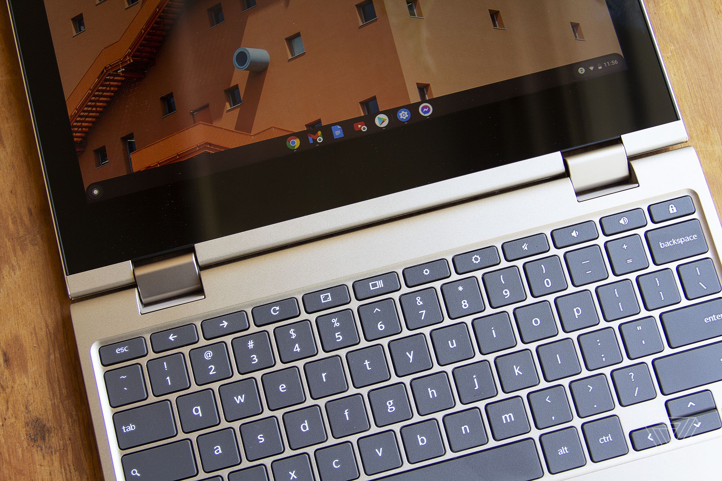 The Lenovo Ideapad Flex 3 Chromebook laid flat on a wooden table, seen from above, angled slightly to the left.