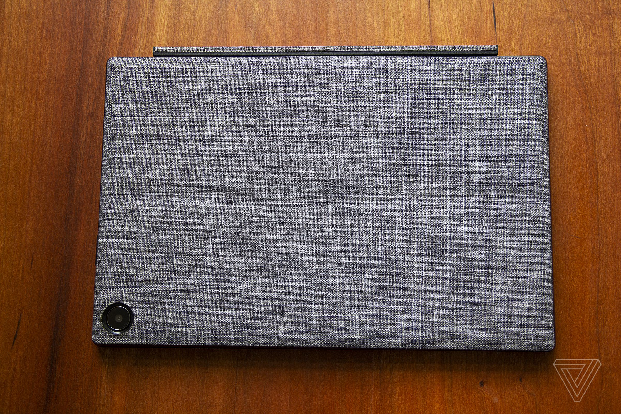 The Asus Chromebook Detachable CM3 closed with the camera facing upwards, seen from above.
