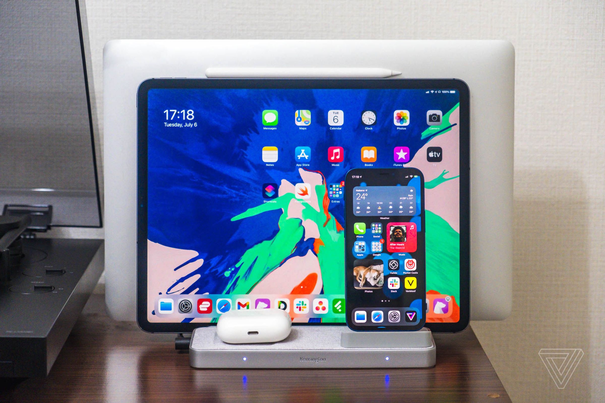 The StudioCaddy is designed to hold a MacBook and iPad while wirelessly charging an iPhone and AirPods.
