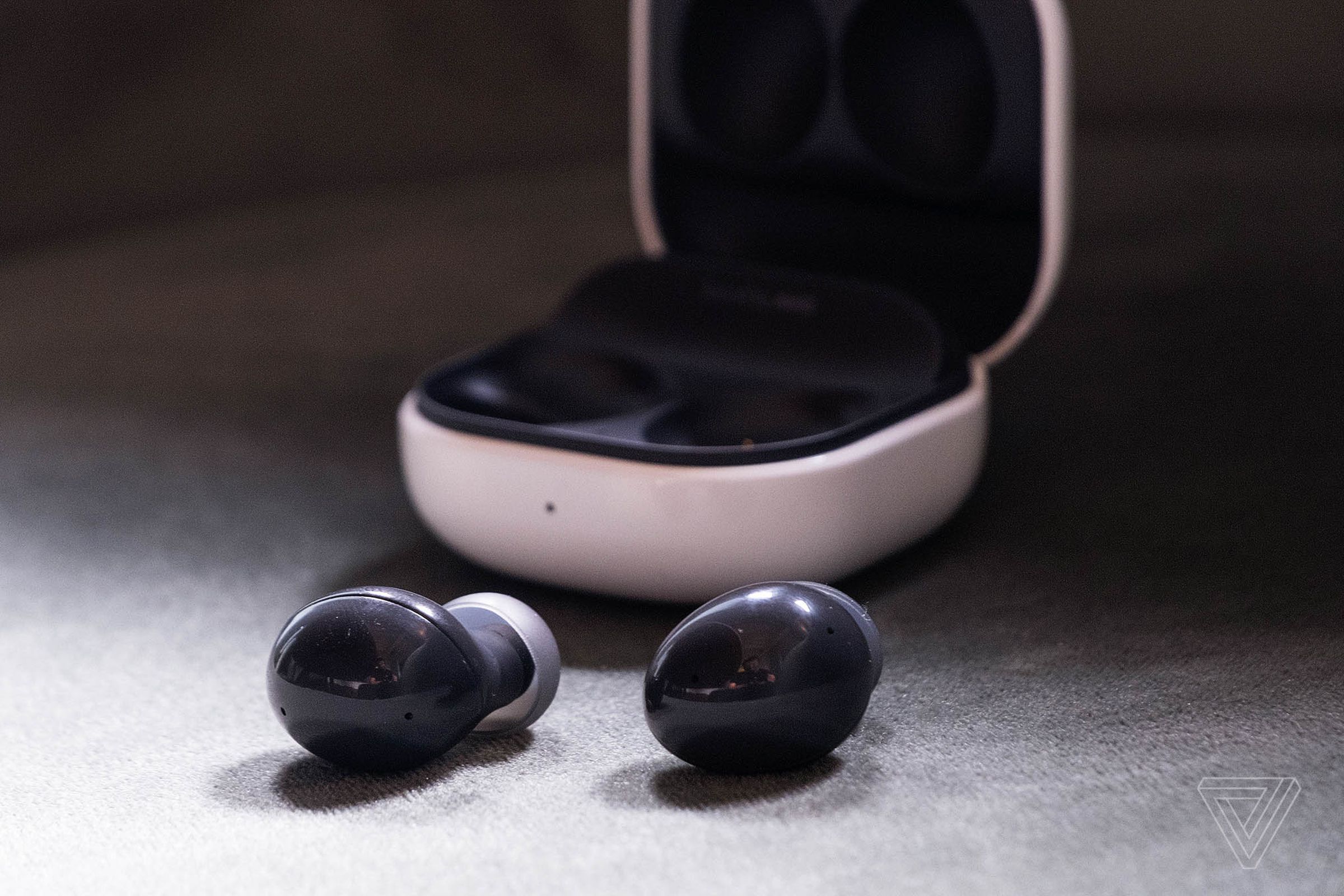 The Samsung Galaxy Buds 2 sitting outside their case.