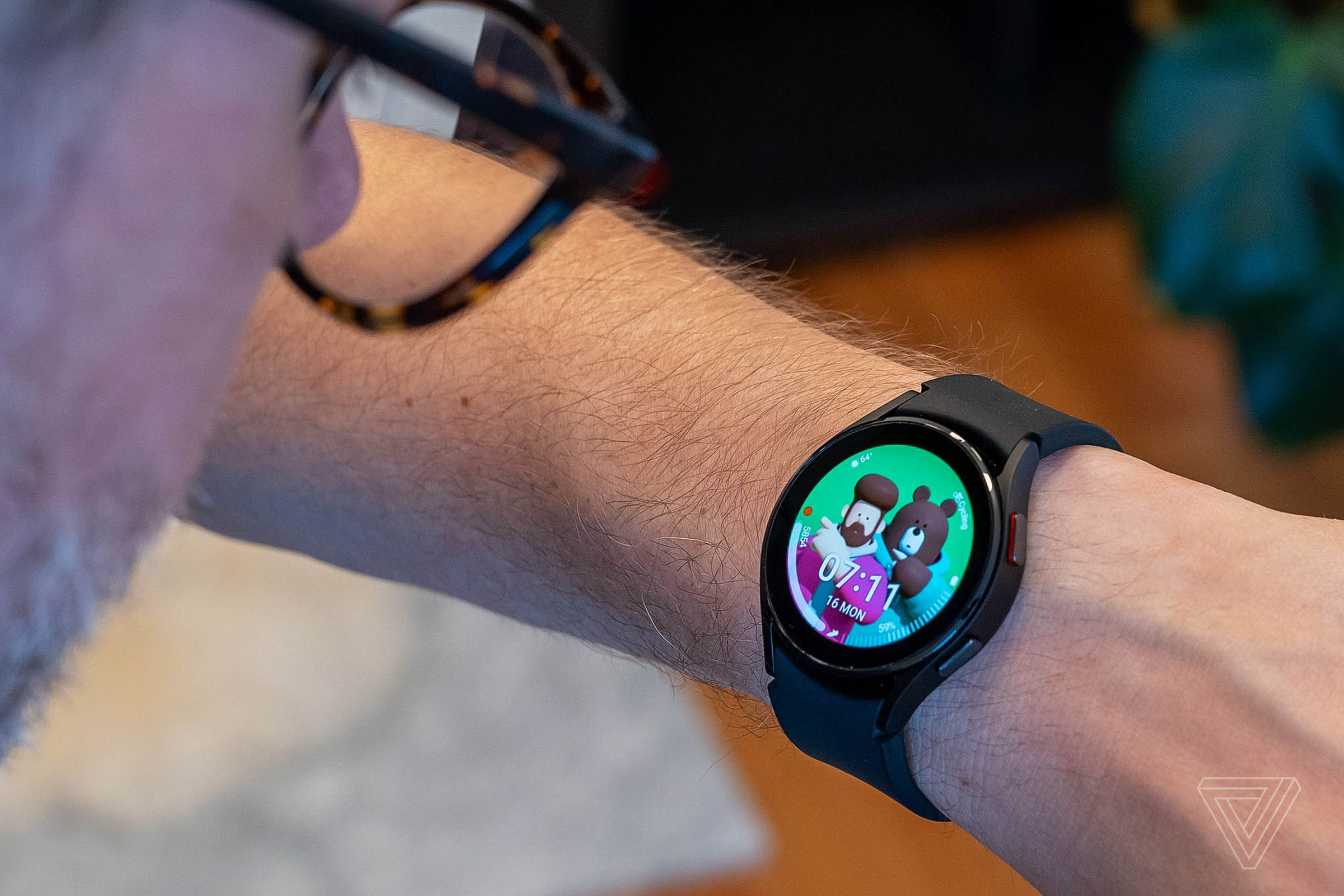 The Galaxy Watch 4 Classic with a fun bear-themed watch face.