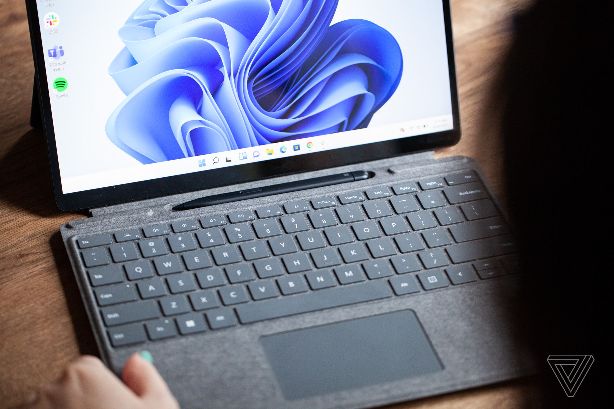 The Surface Slim Pen 2 sits inside the Surface Pro 8 keyboard.