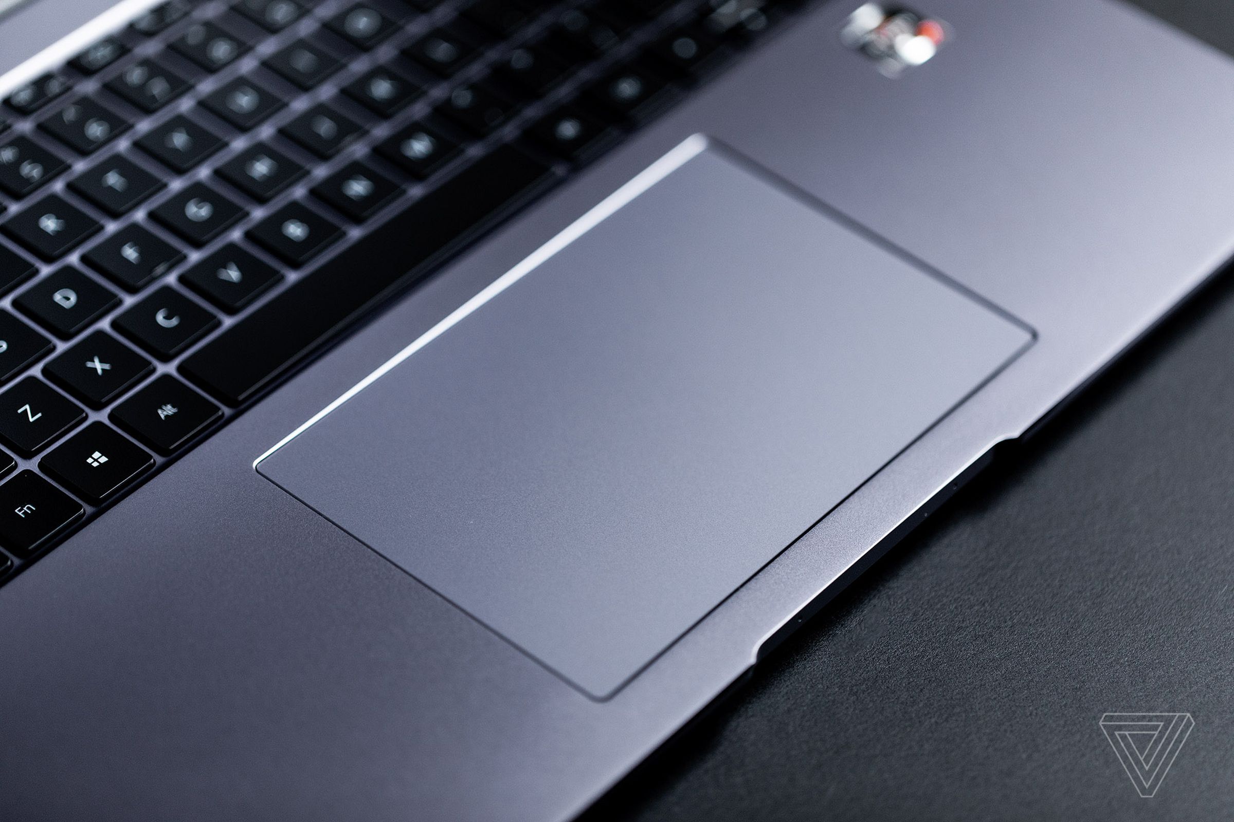 The touchpad on the Huawei MateBook 16 seen from above and to the left.