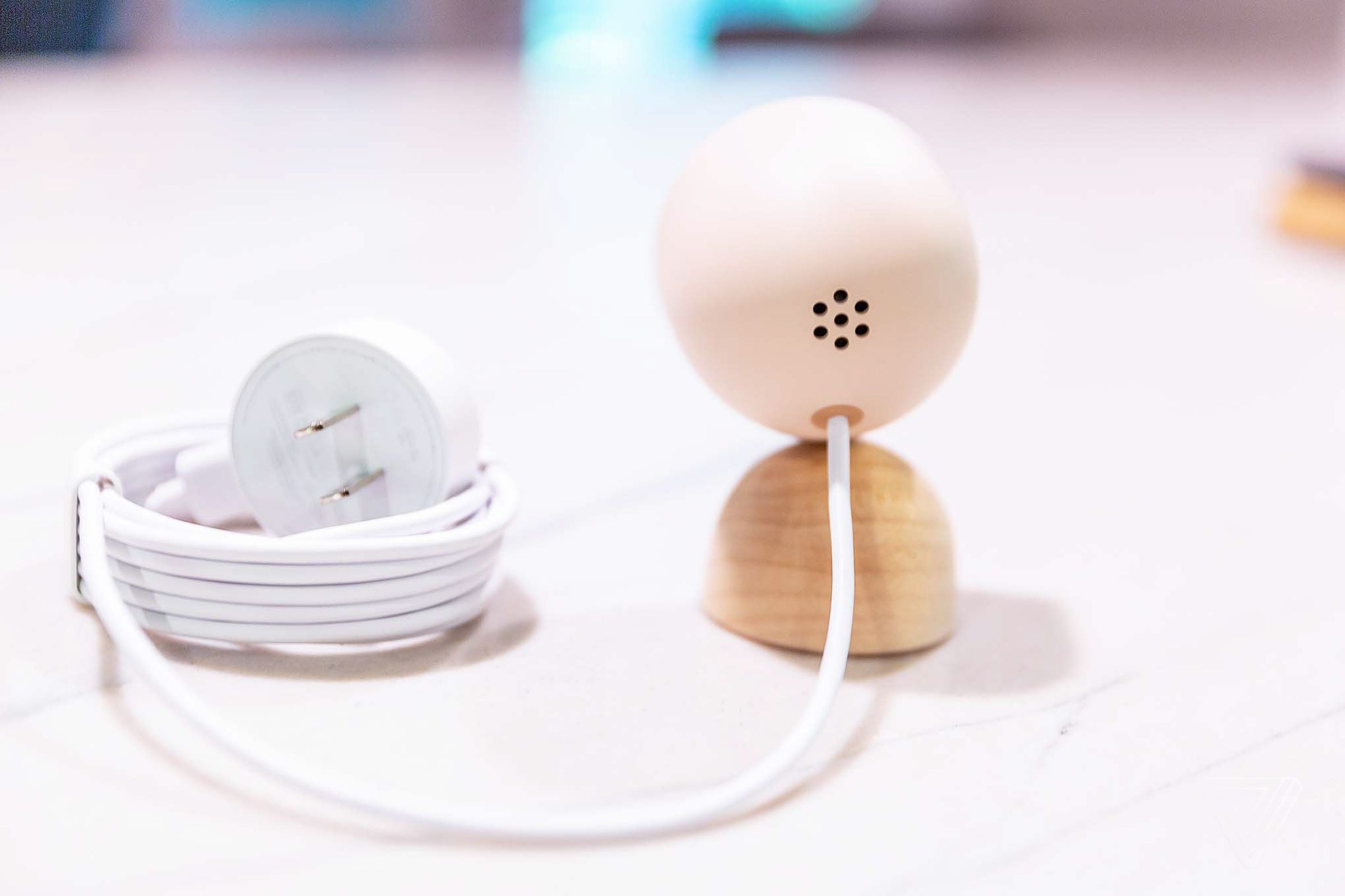 The Nest Cam uses an attached 10 foot USB-A power cable, which can plug into the included power brick.  