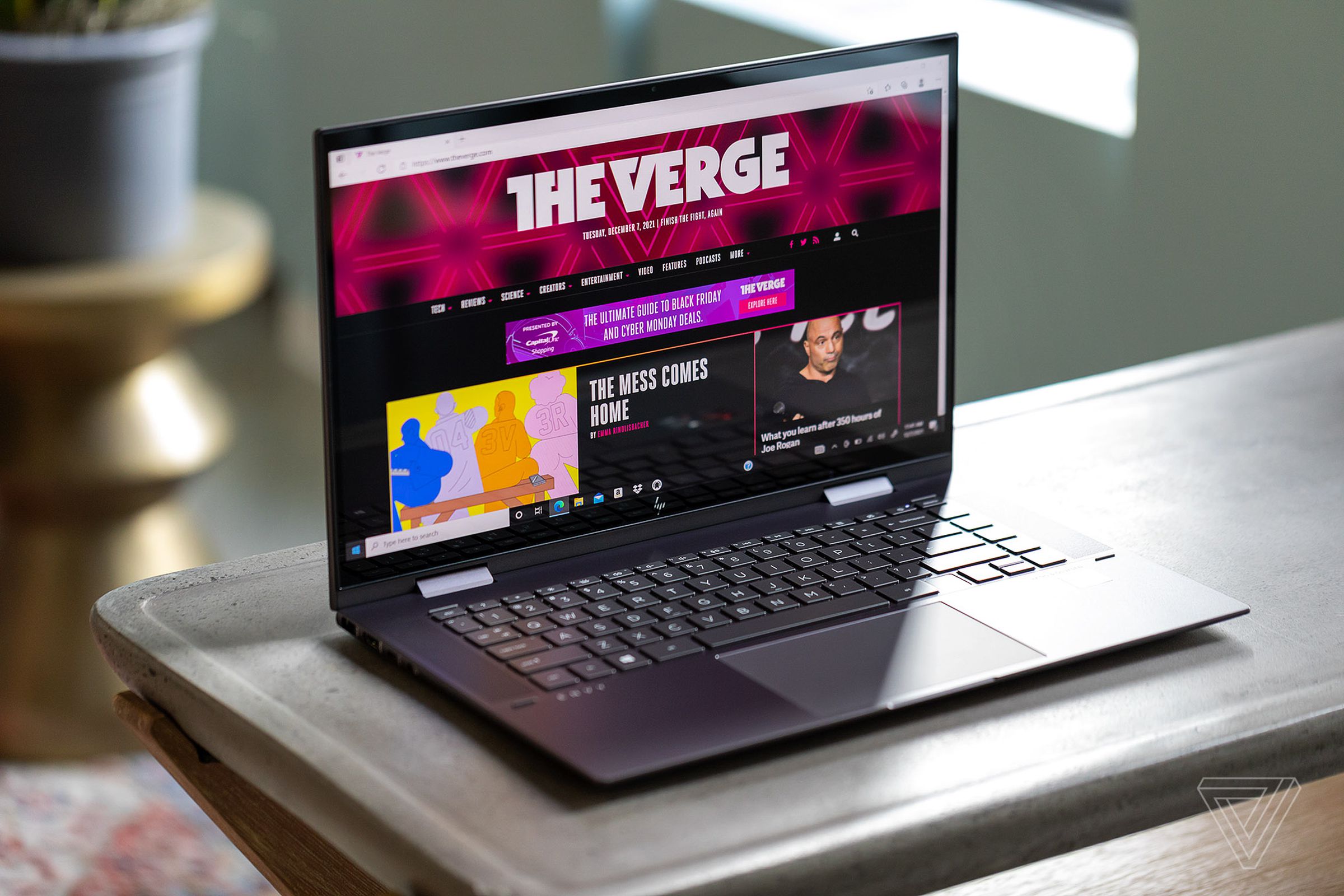 Best Cheap Laptop 2023: The HP Envy x360 15 displaying The Verge homepage.