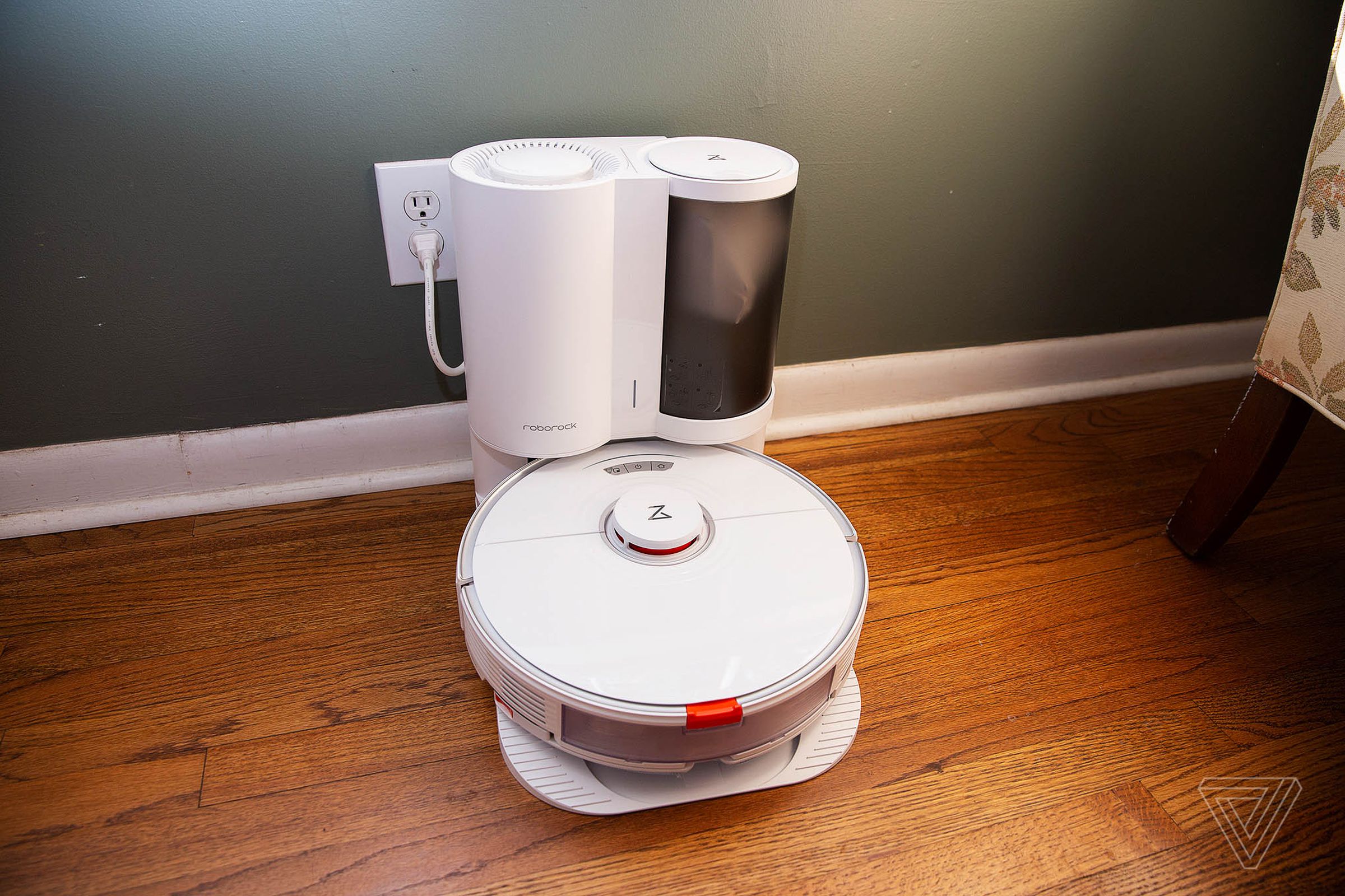 An image of Roborock’s S7 Plus robot vacuum on its charging stand.