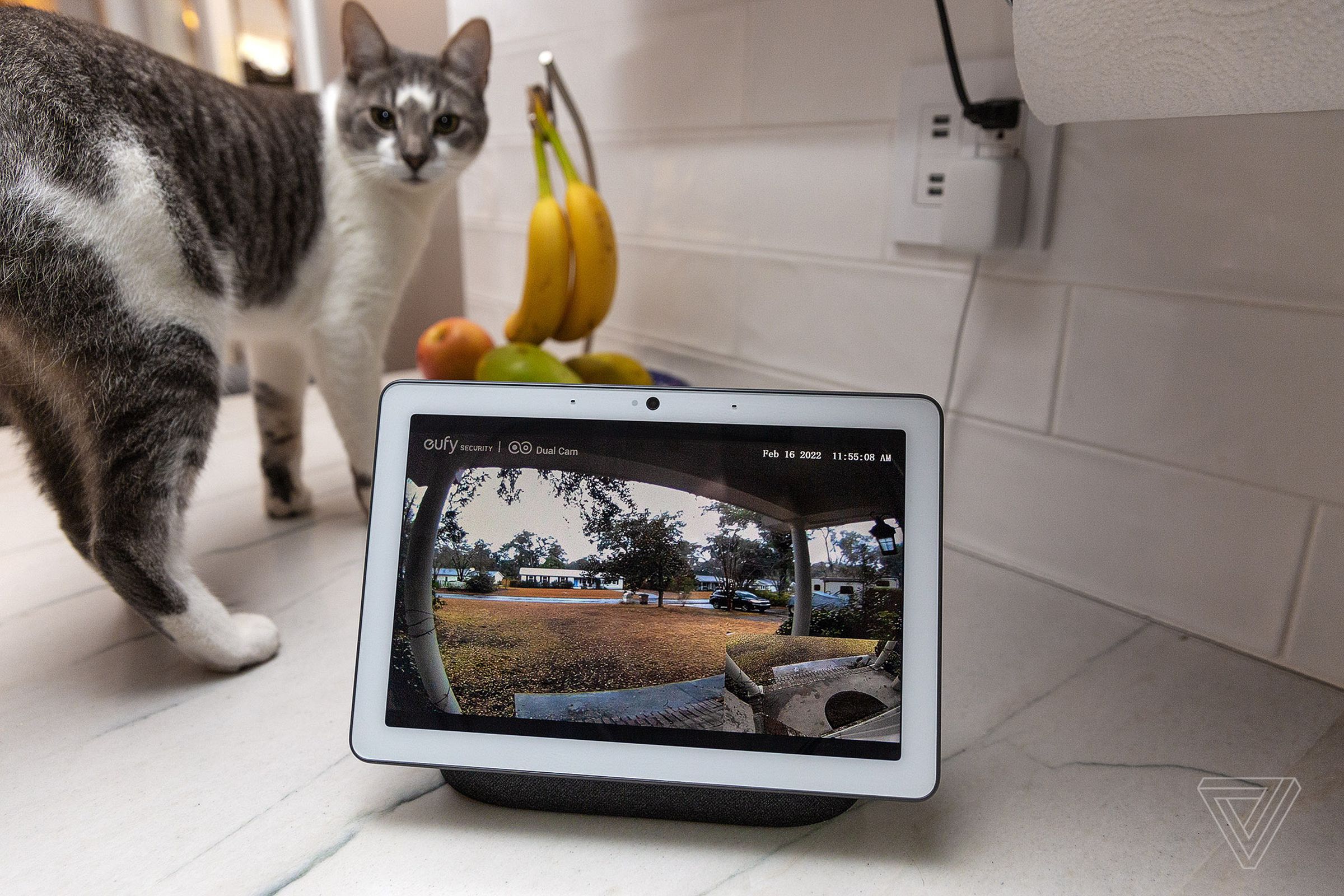 A Google Nest Hub Max displaying a live feed from a Eufy doorbell camera. The Eufy has two cameras, so the second is shown as a picture-in-picture.