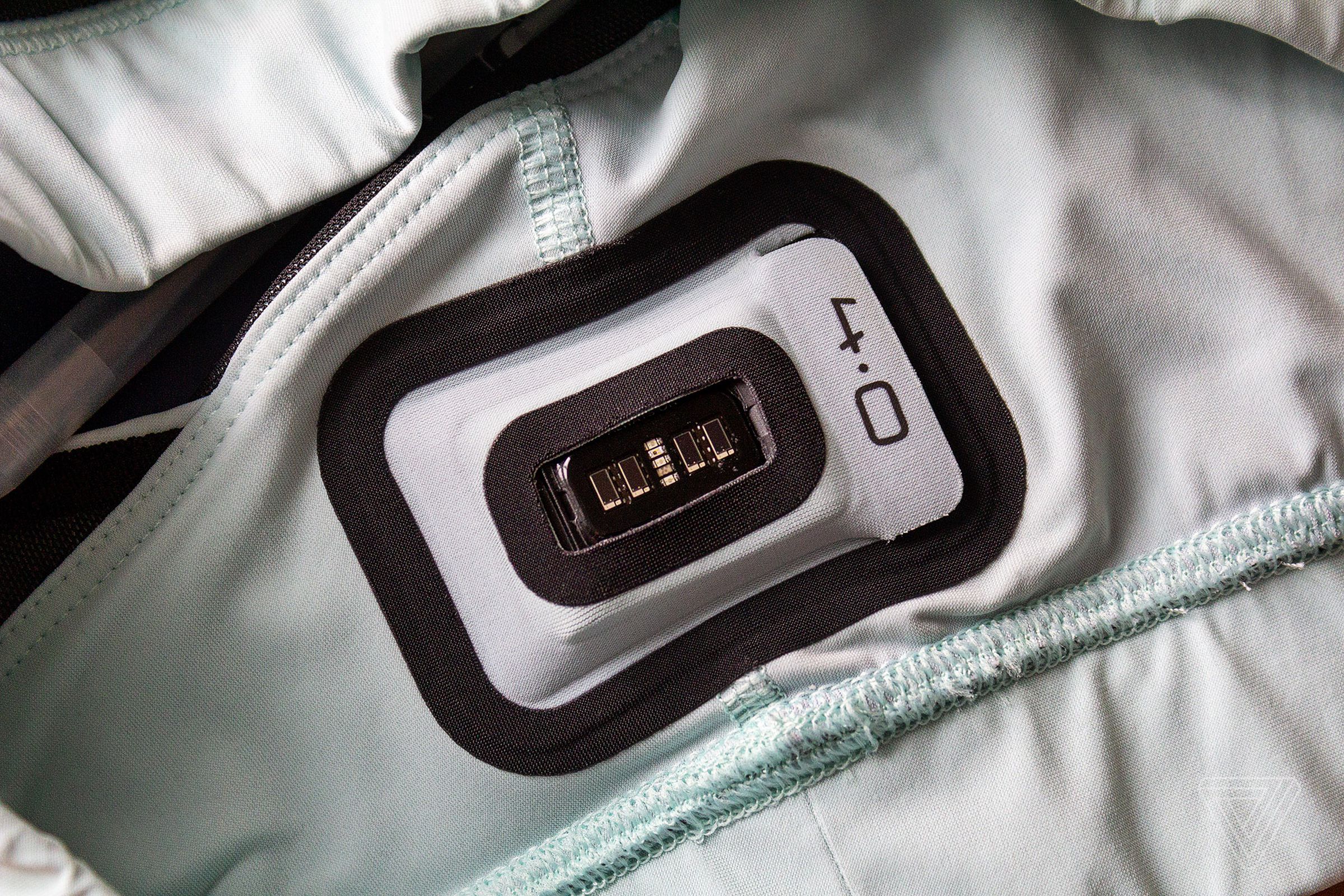 The Whoop 4.0 in a special pocket in a sports bra