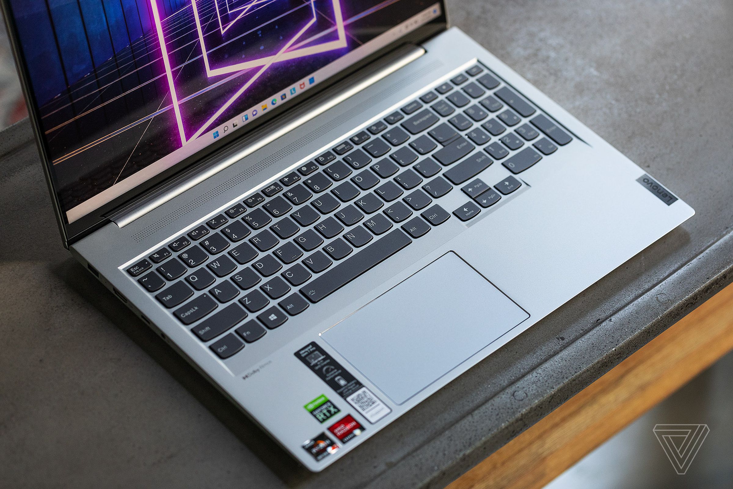 Lenovo fit a spacious keyboard and a full numpad in the IdeaPad Slim 7 Pro’s deck.