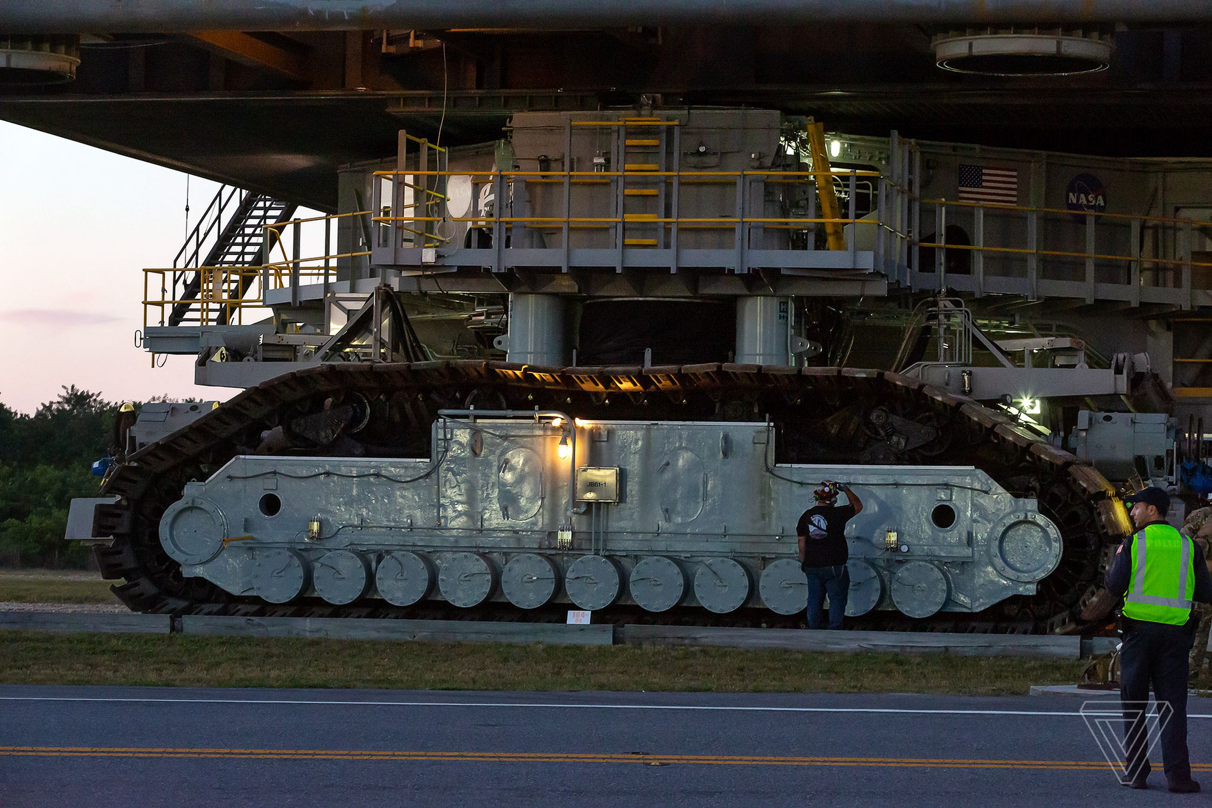 The massive treads of the crawler transporter that carries the SLS to the pad