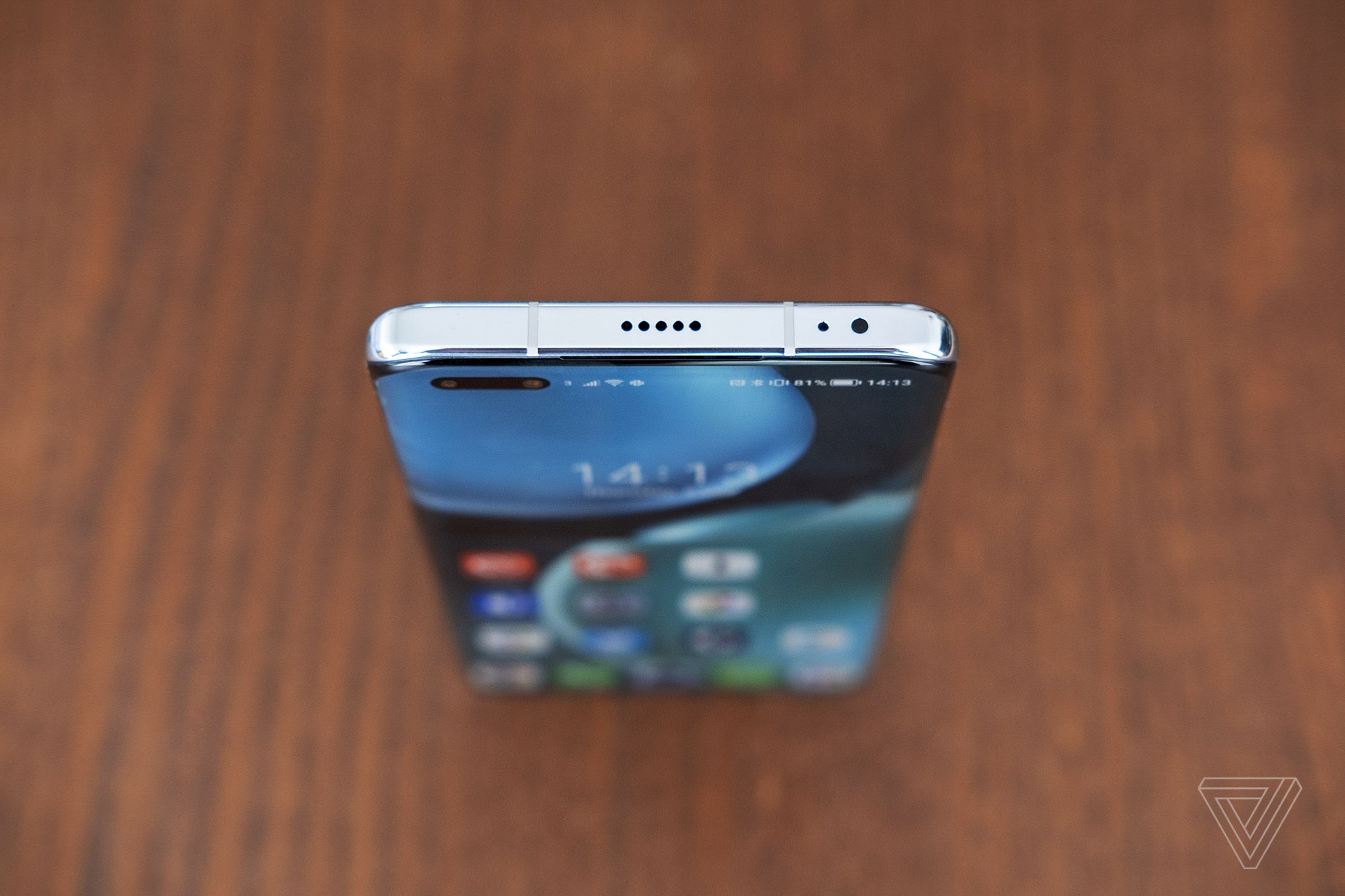 The display curves round the left and right sides of the phone.