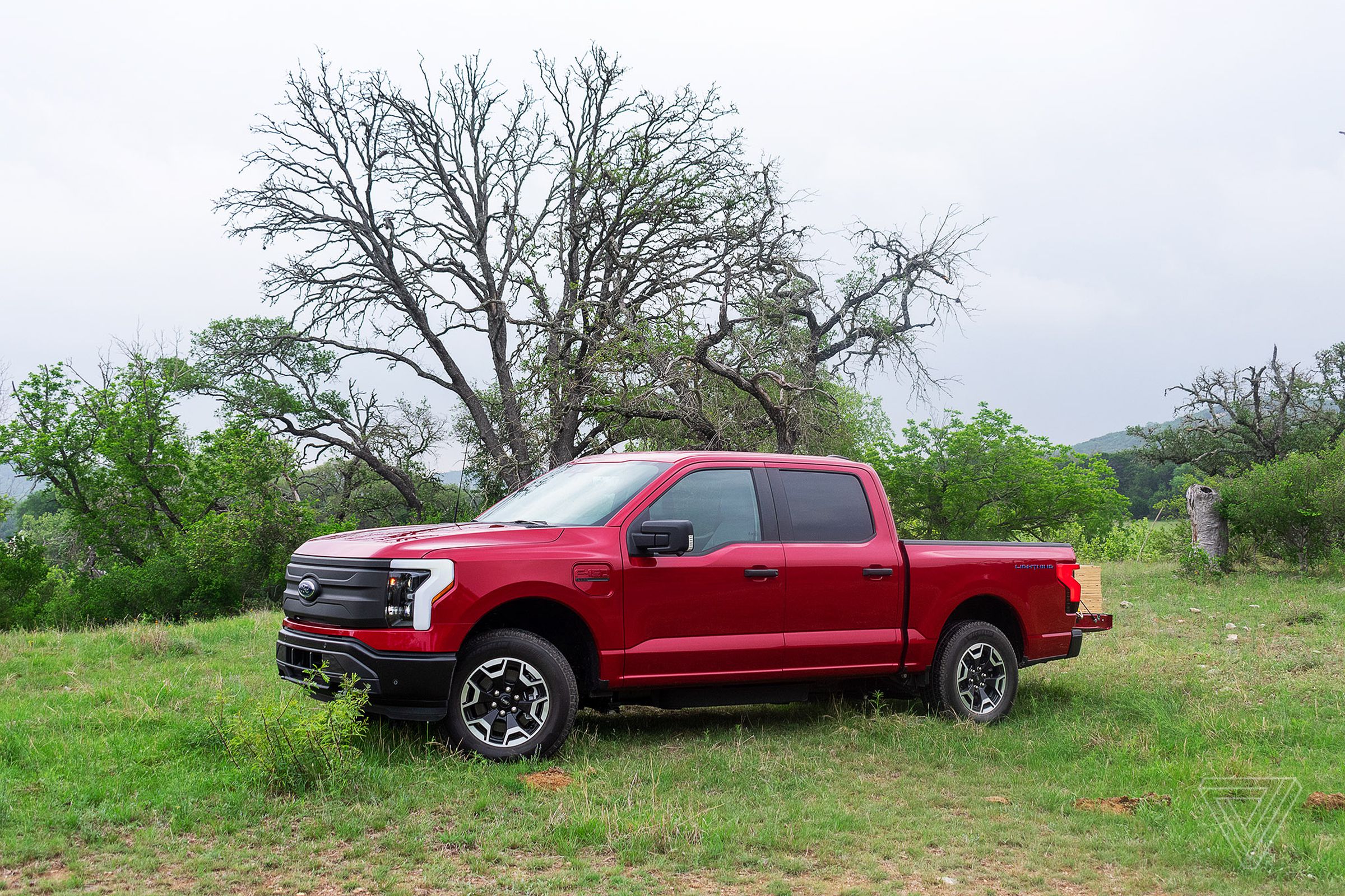 Ford F-150 Lightning electric truck in a field