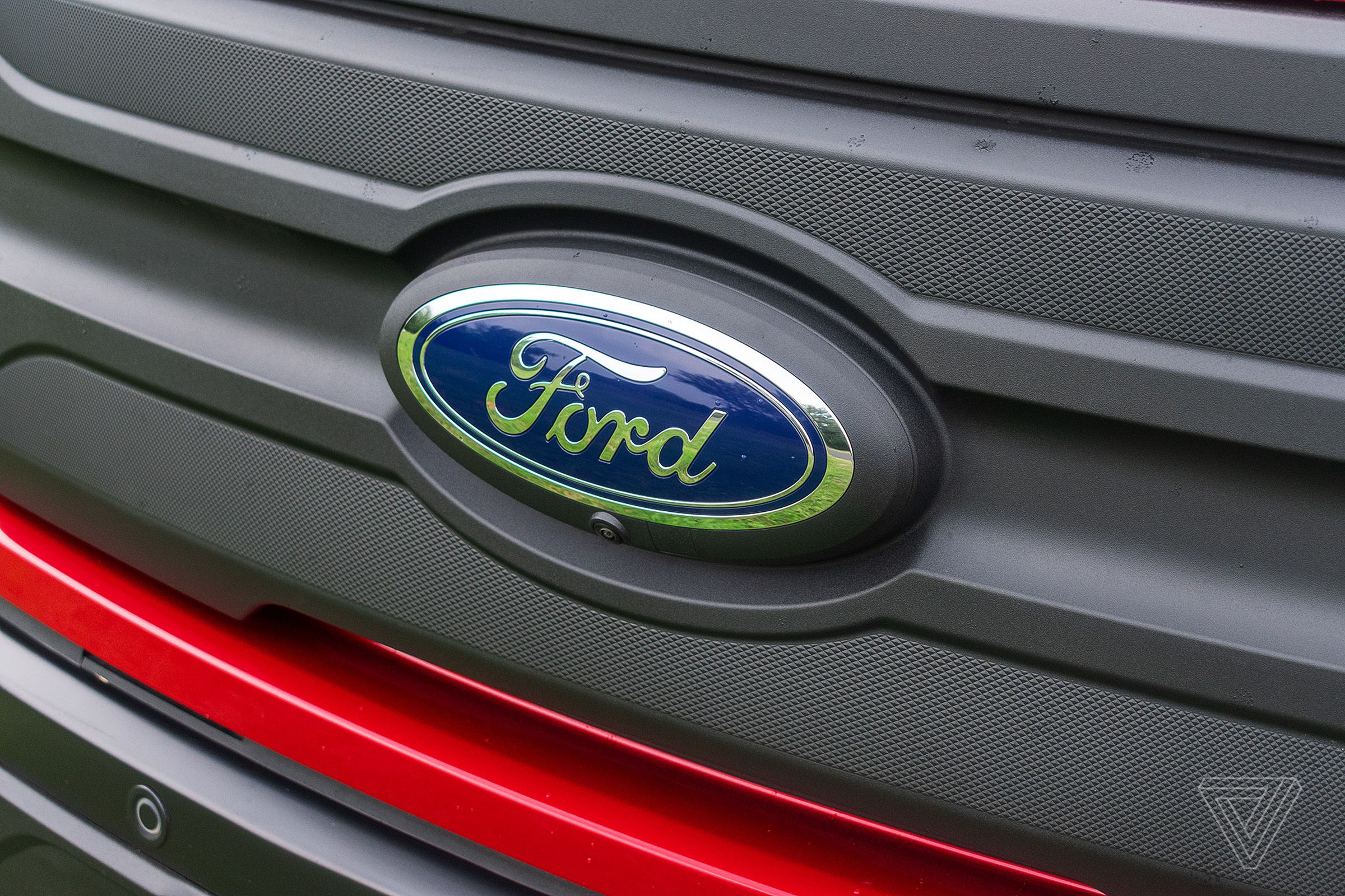 Ford logo on the front of an F-150 Lightning