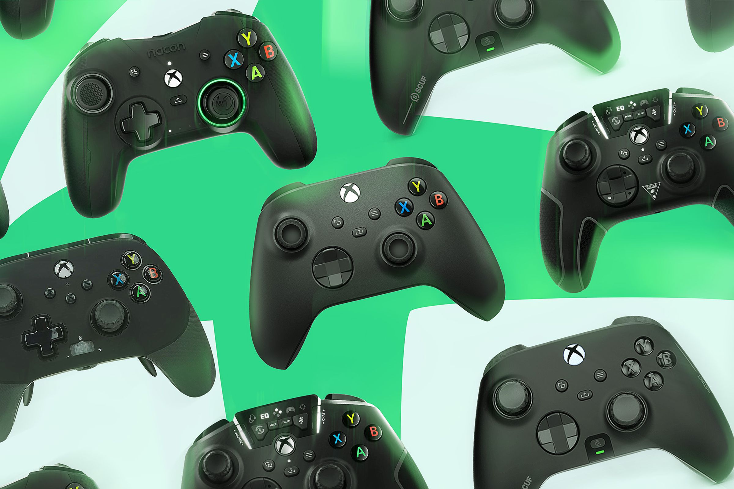 A collection of Xbox controllers.