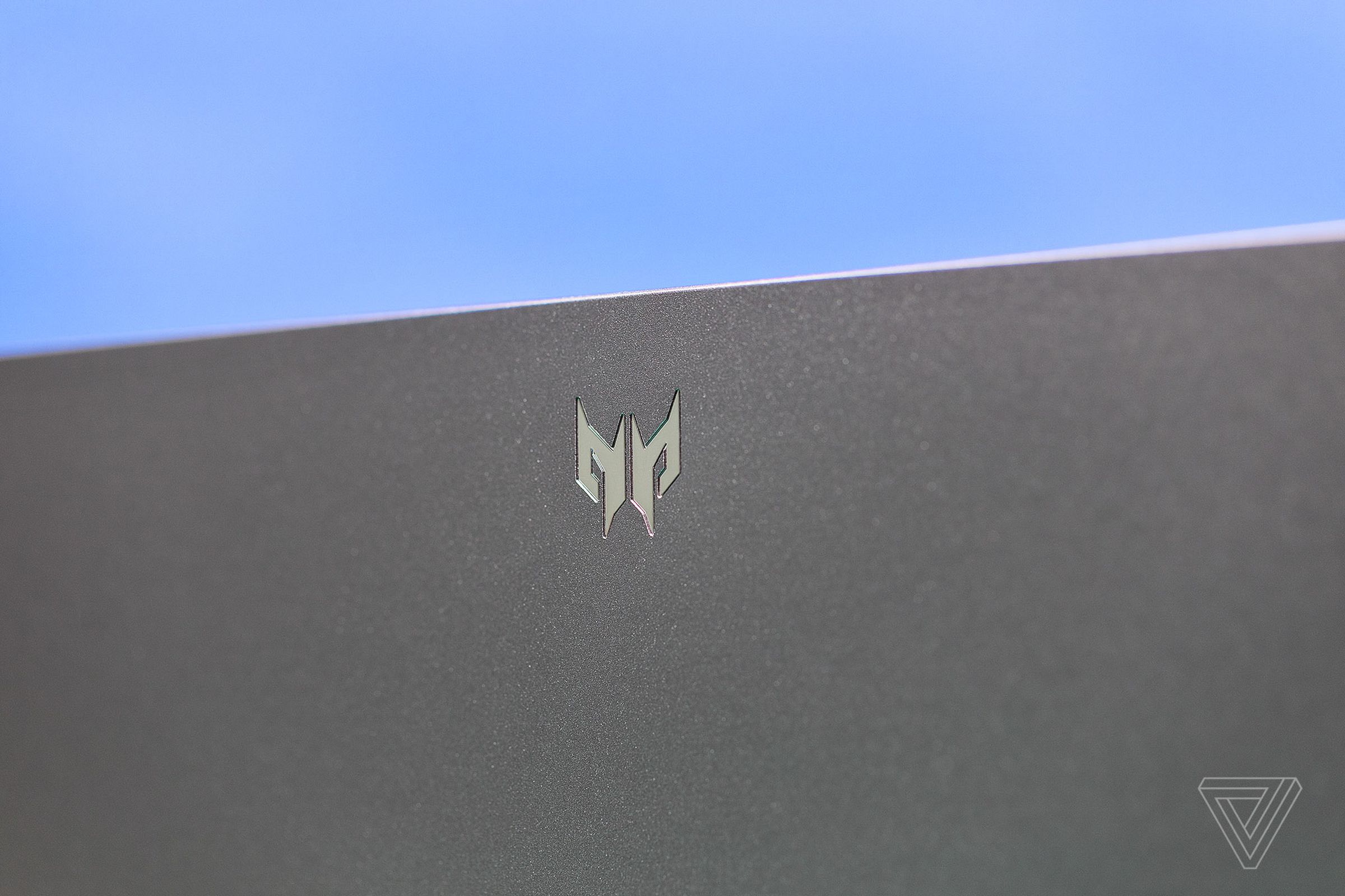 A close-up photo detailing the Predator logo on the lid of the Acer Predator Triton 500 SE