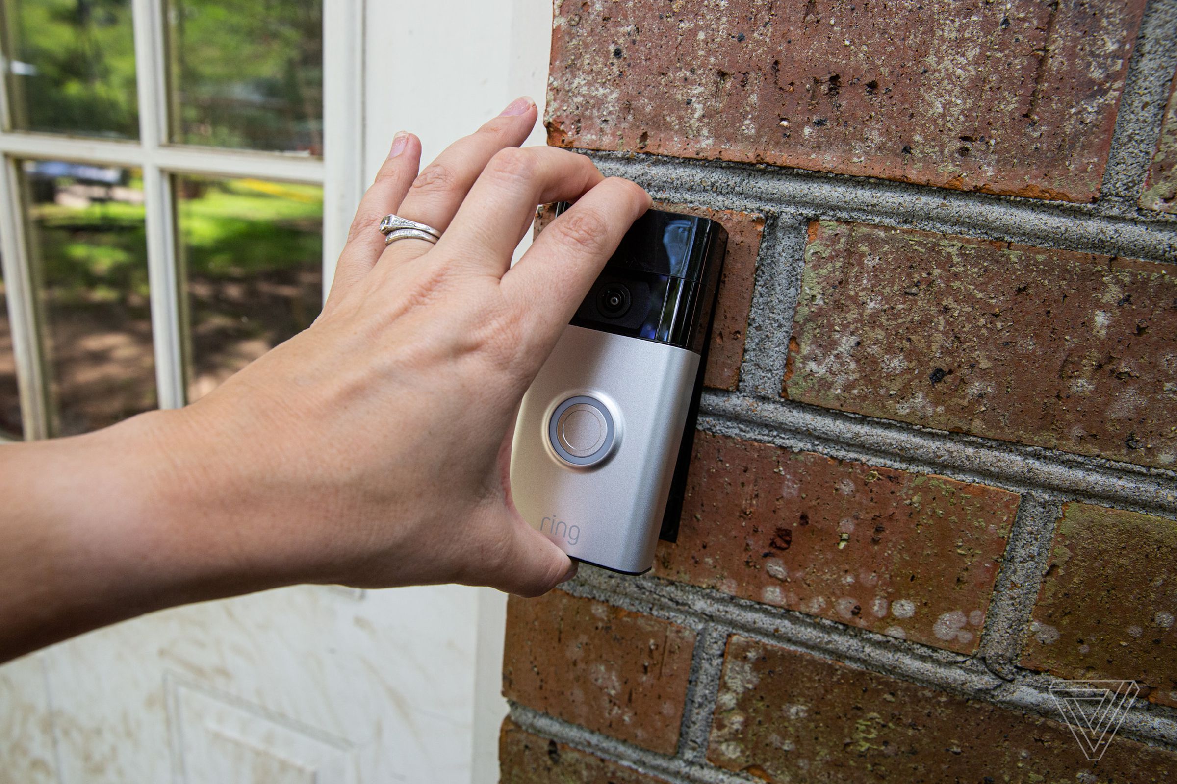 The Ring Video Doorbell 2020 attaches to a mounting bracket.