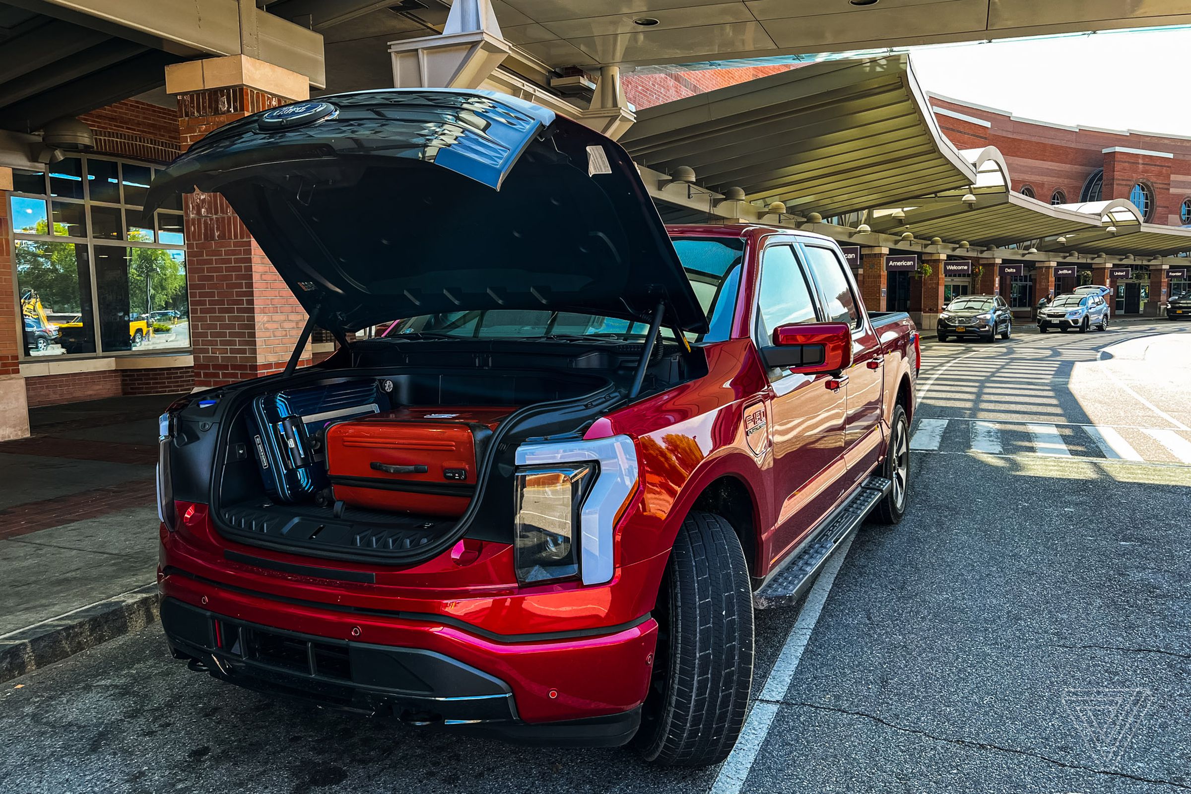 The F150 Lightning front truck open at an airport