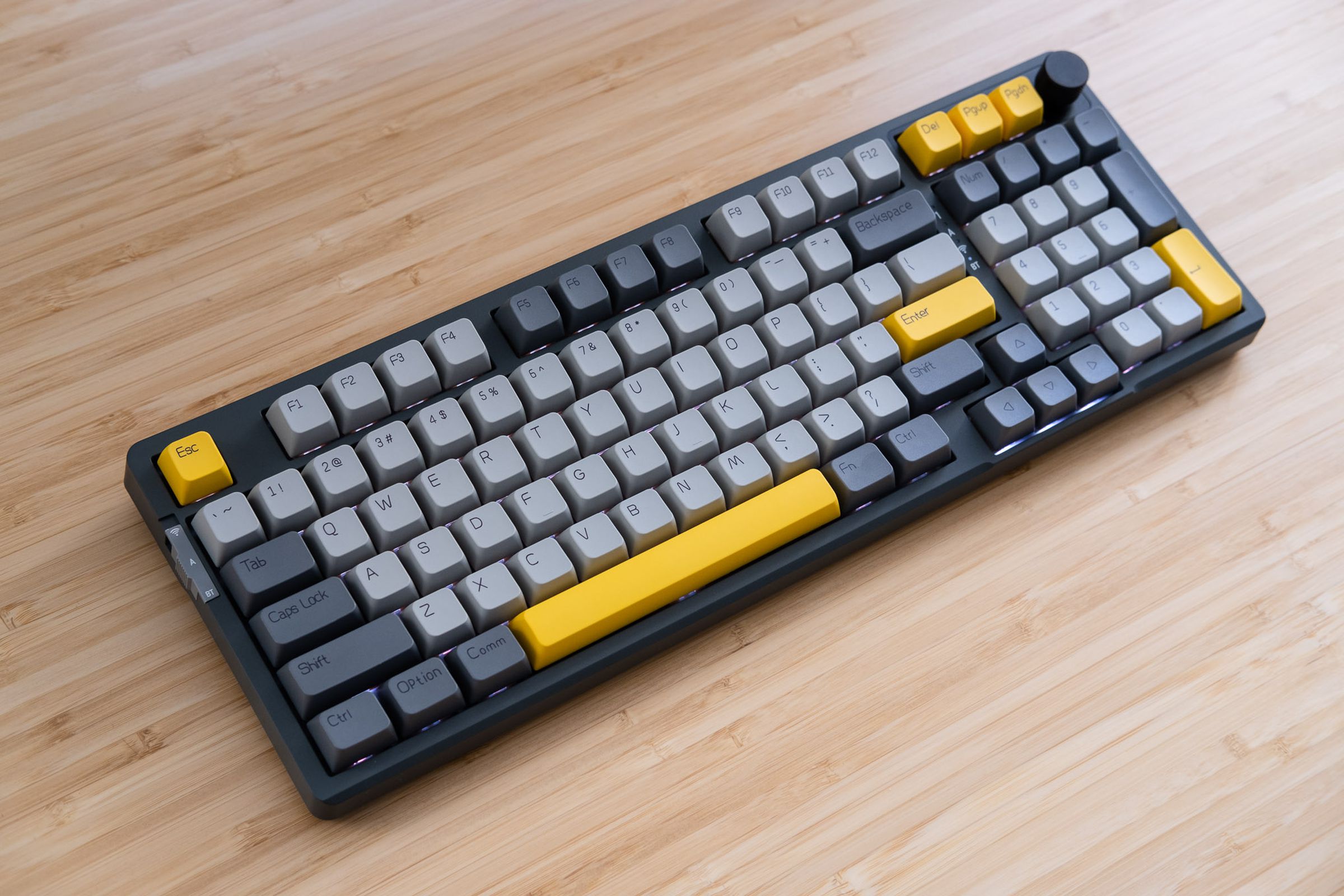The Ajazz AK966 keyboard on a desk.