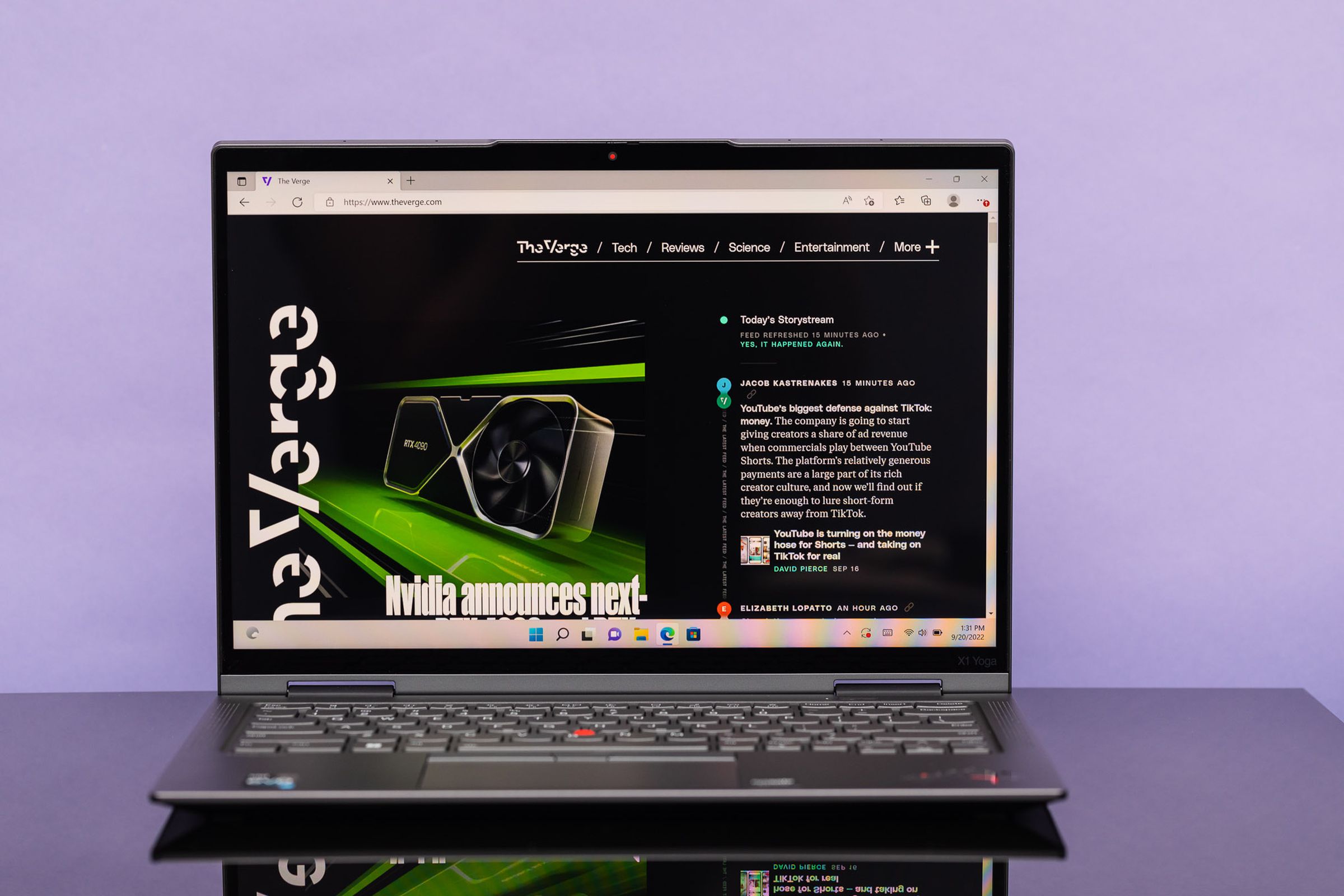 The ThinkPad X1 YOga Gen 7 open, displaying The Verge homepage.