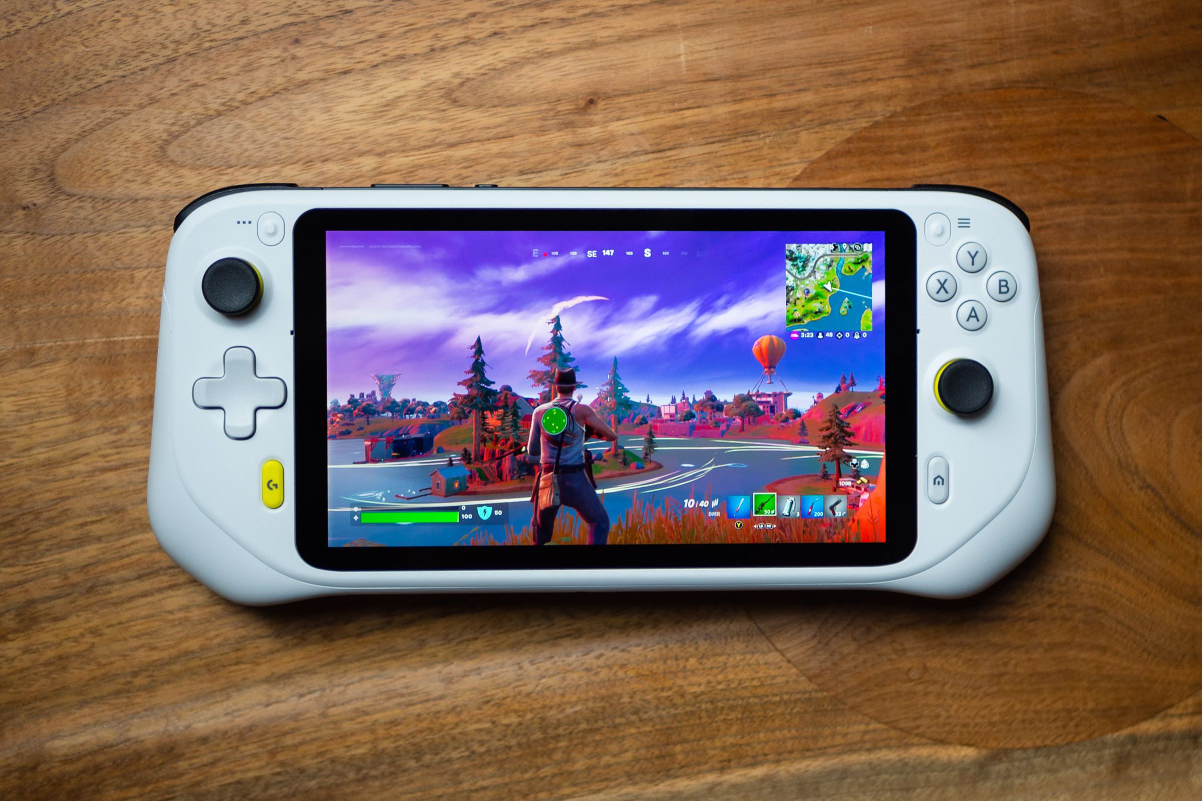 The Logitech G Cloud Gaming Handheld is shown running Fortnite over the cloud.