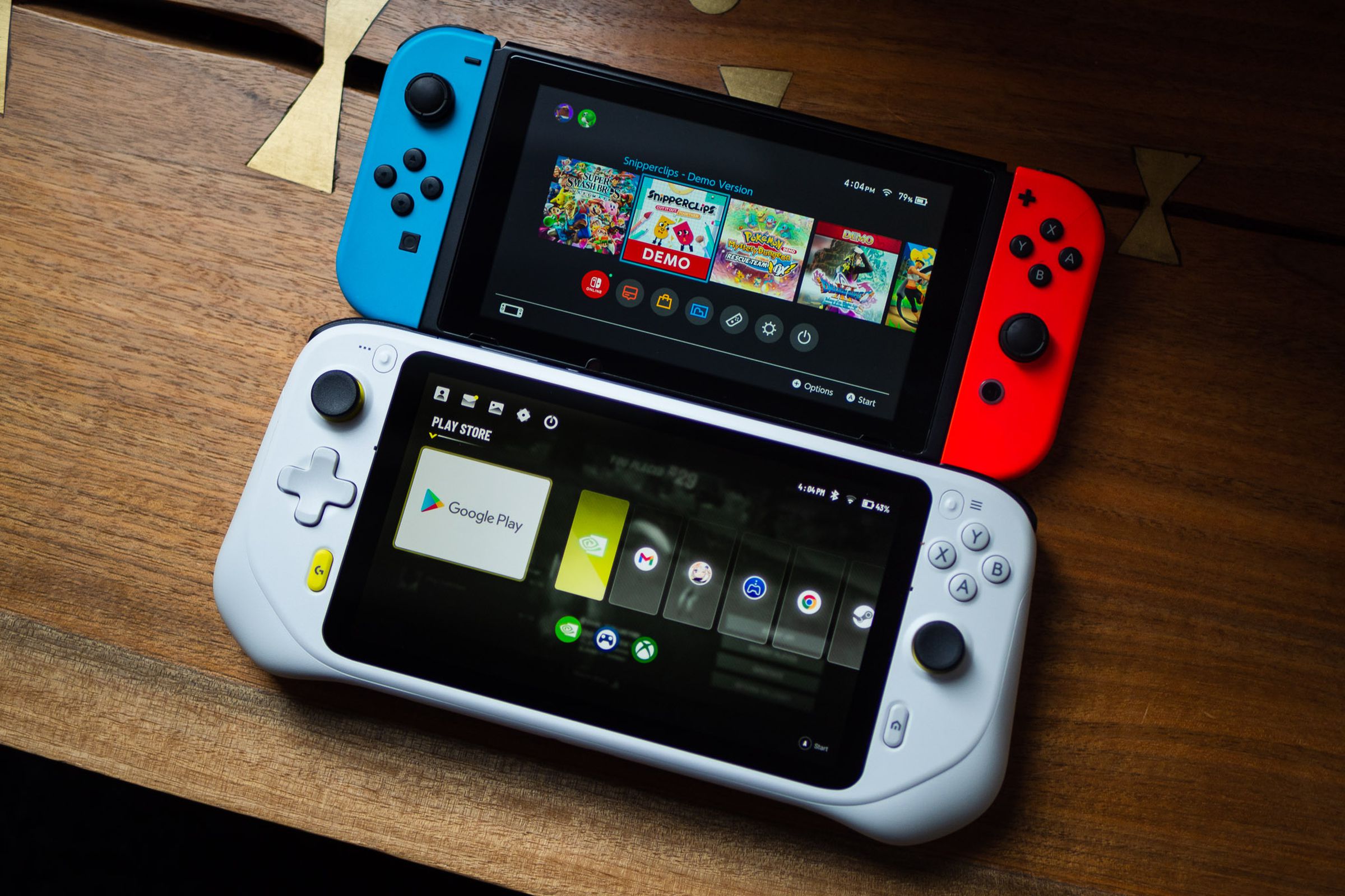 The Logitech G Cloud Gaming Handheld is shown sitting next to a Nintendo Switch. Logitech’s handheld is bigger, but not by much.