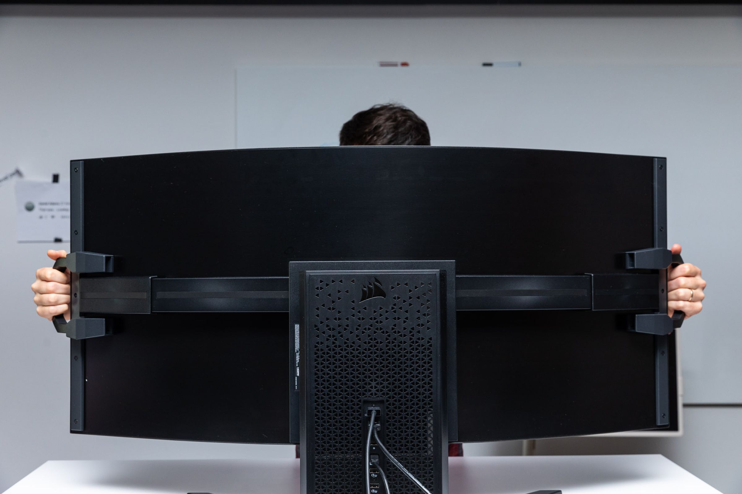 The rear of Corsair’s Xeneon Flex, showcasing its bending mechanism and video ports.