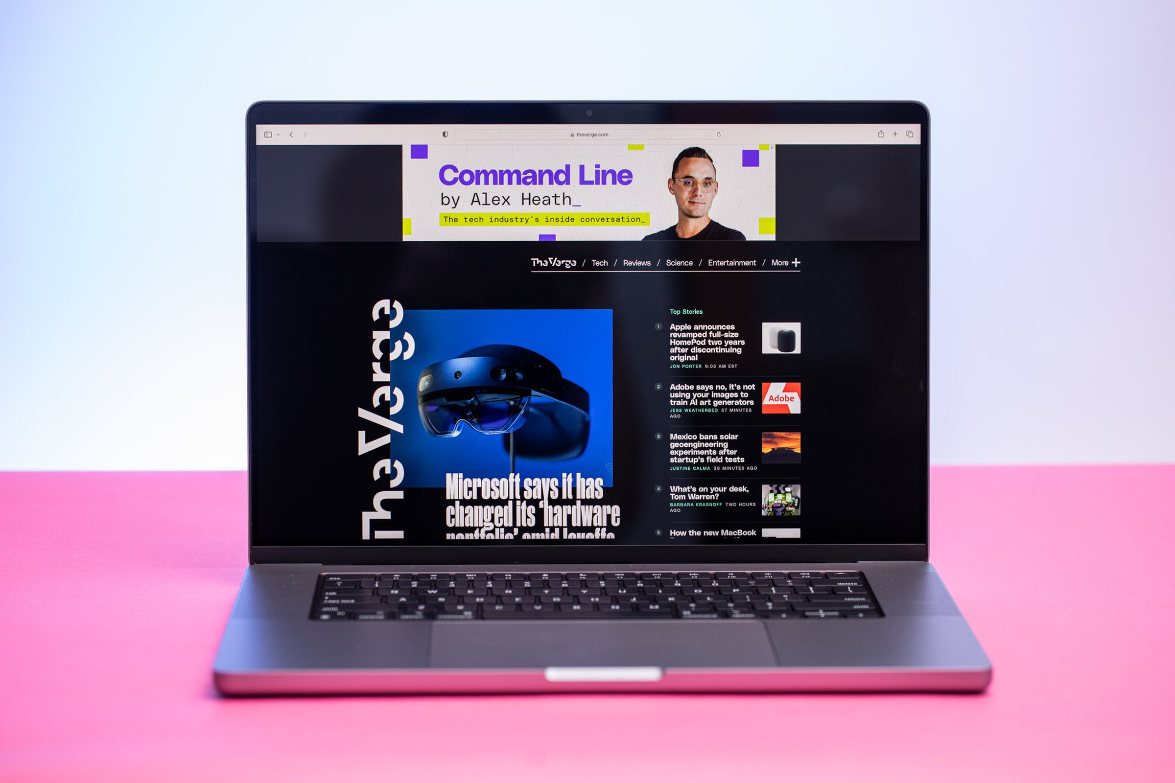 The MacBook Pro 16 displaying The Verge homepage.