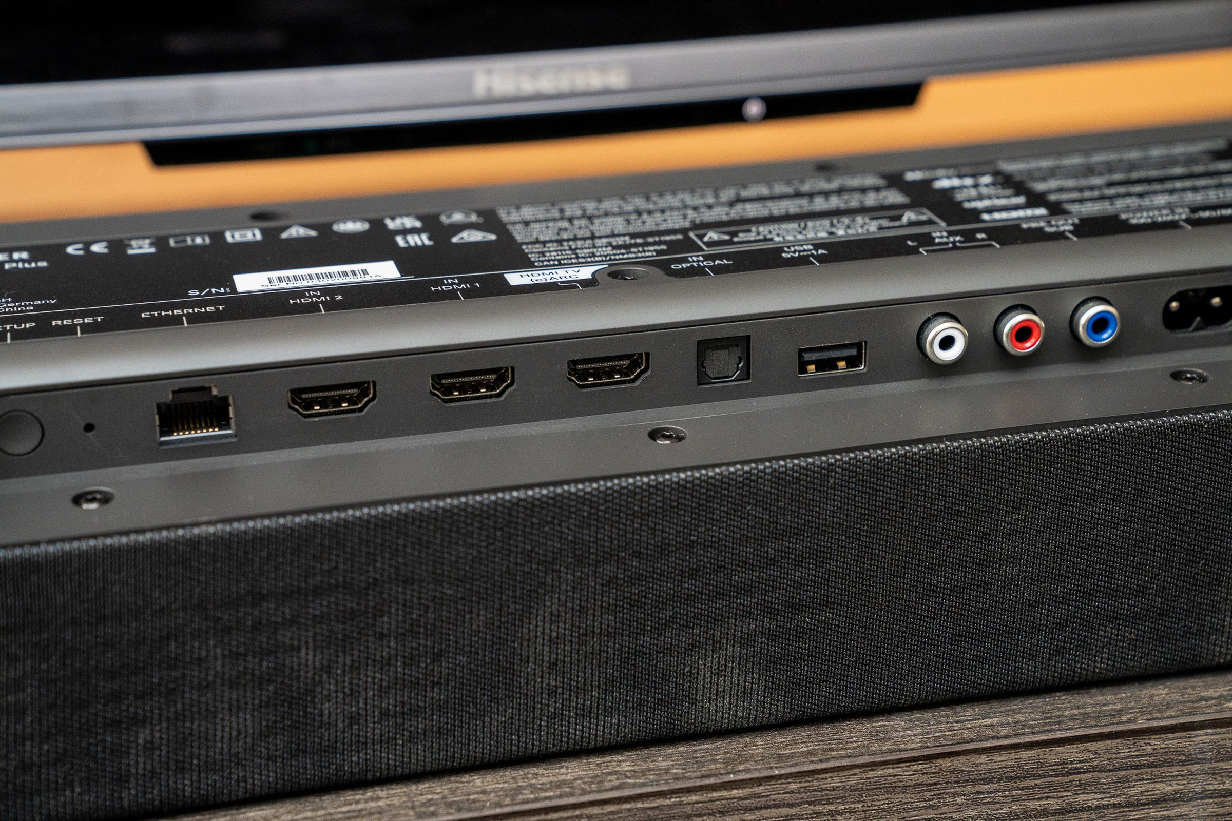 A photo of Sennheiser’s Ambeo Soundbar Plus and related accessories.