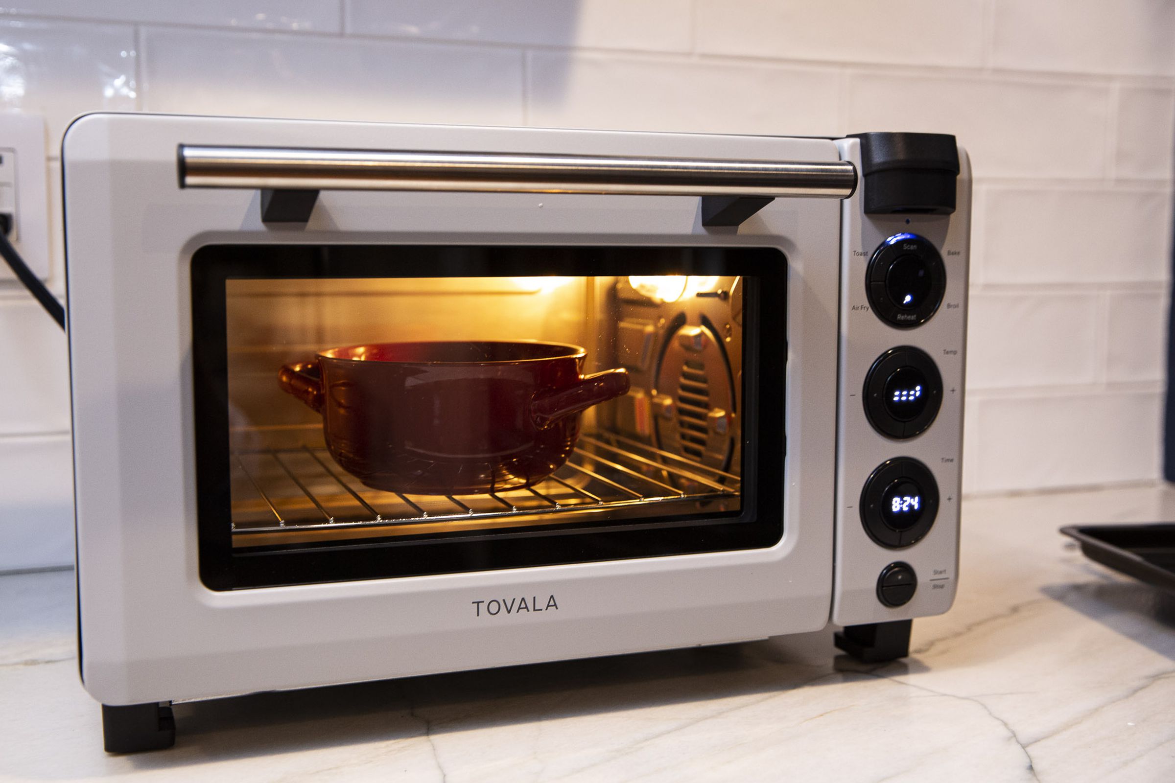 The Tovala Oven has simple, easy-to-use physical controls and a very handy reheat button.
