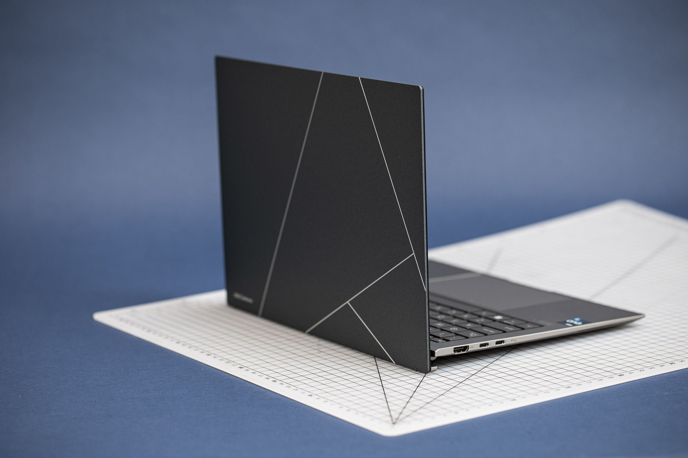 The Asus Zenbook S 13 OLED seen from the back right.