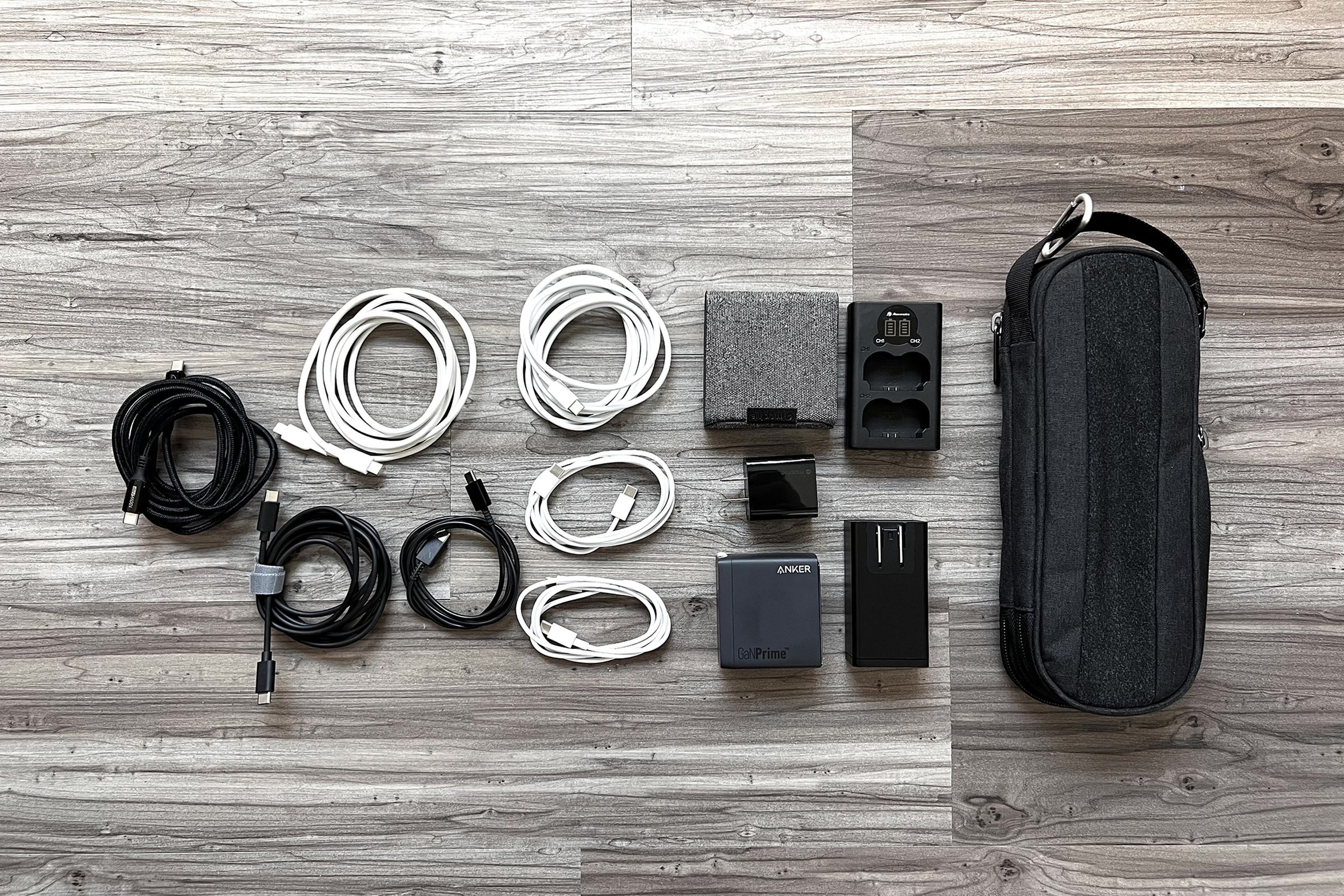 Travel cables on table with case