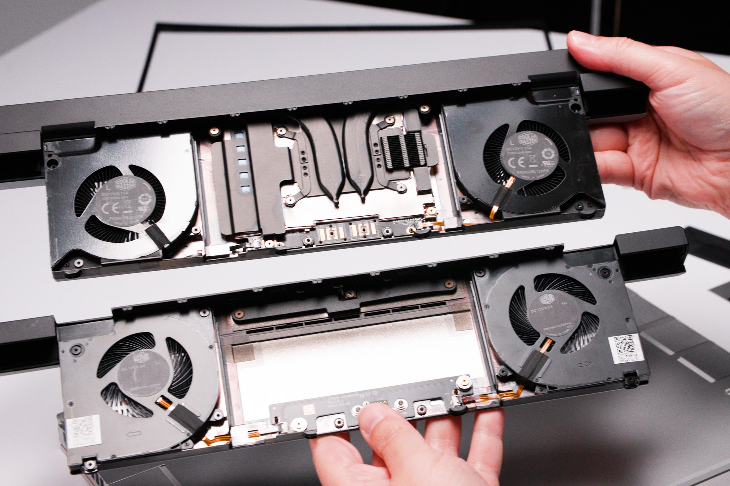 The modular GPU (above)  vs. the default Expansion Bay Shell (below).
