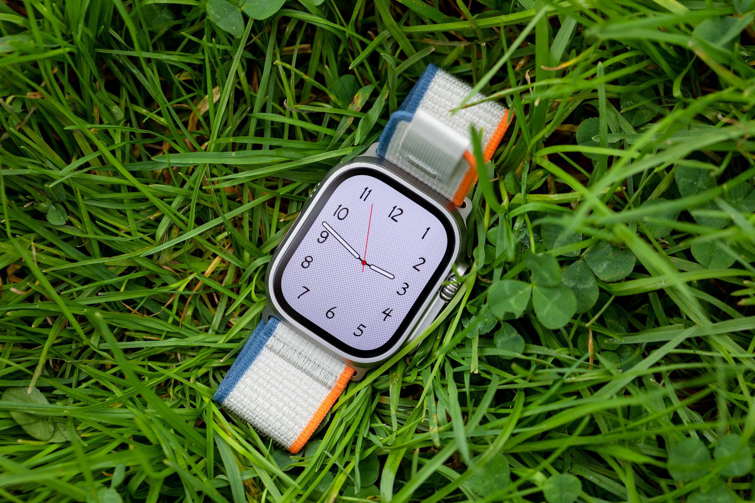 Apple Watch Ultra 2 on the grass.