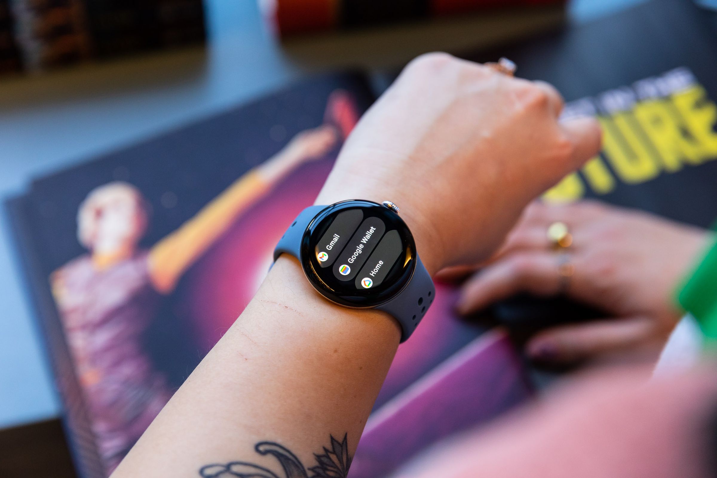 Person looking at Google services on the Pixel Watch 2