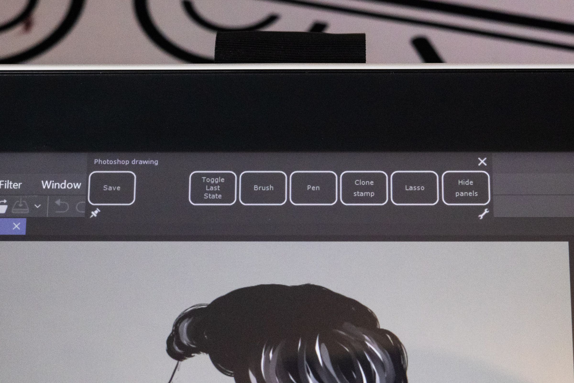 A screenshot of a Wacom One drawing tablet displaying on-screen macro buttons.