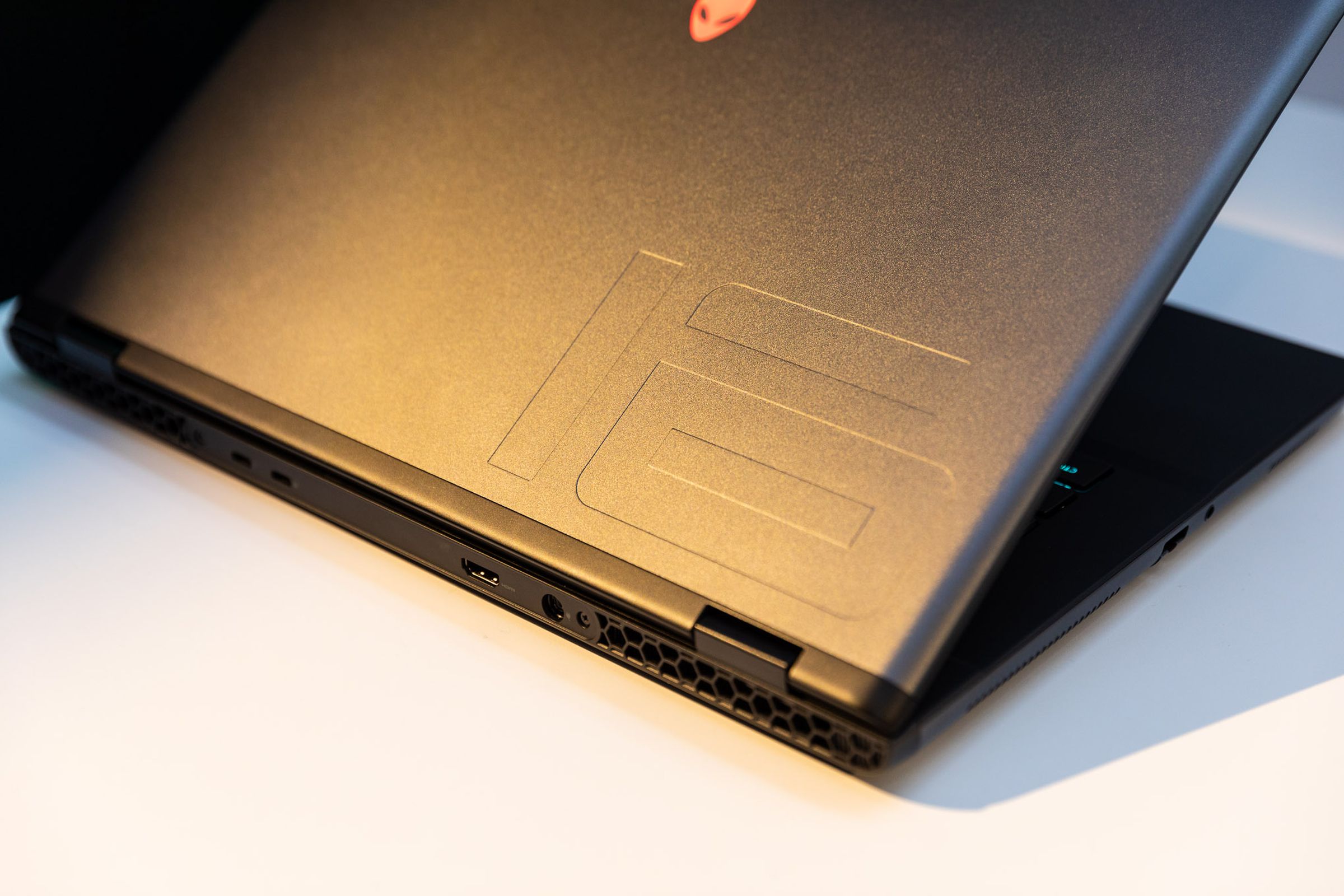 An image of the rear of Alienware M16 R2. It lacks the large thermal shelf Alienware is known for.