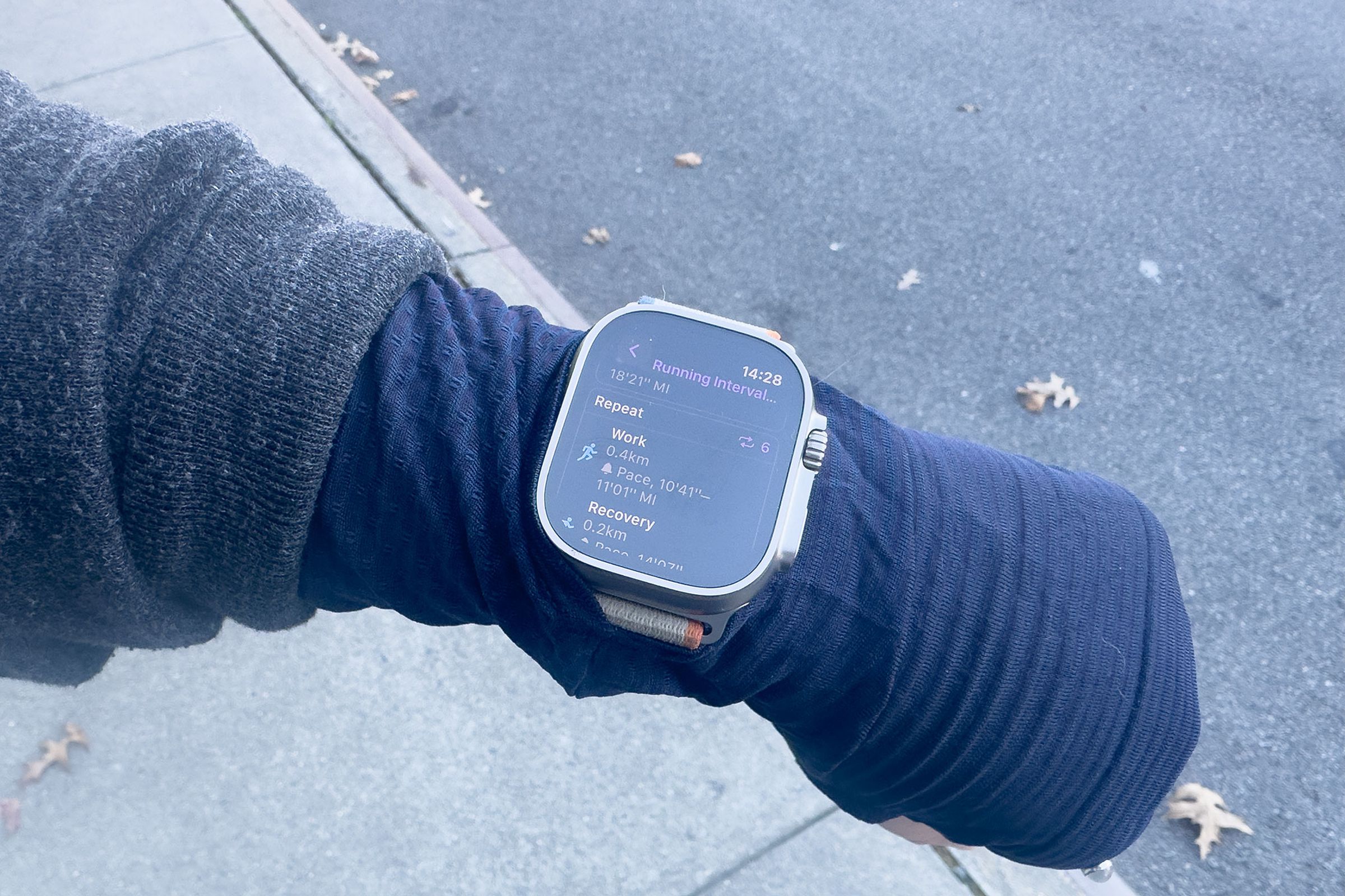 Person looking at interval workout on Apple Watch Ultra 2