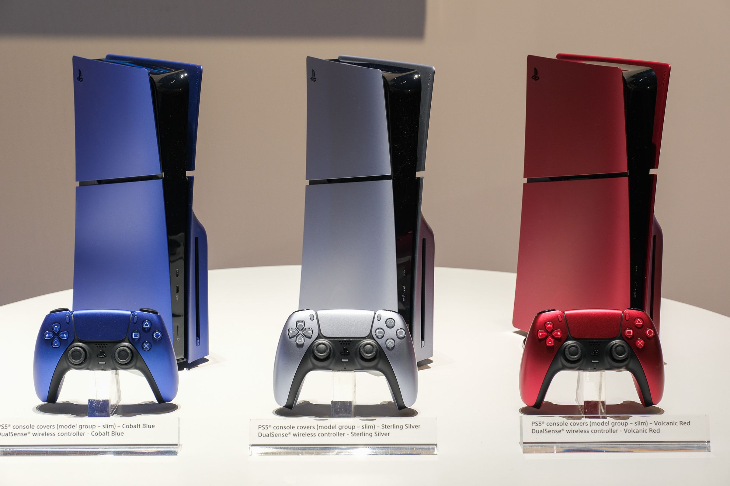 A photo of Sony’s PS5 slim in various colors at CES 2024.