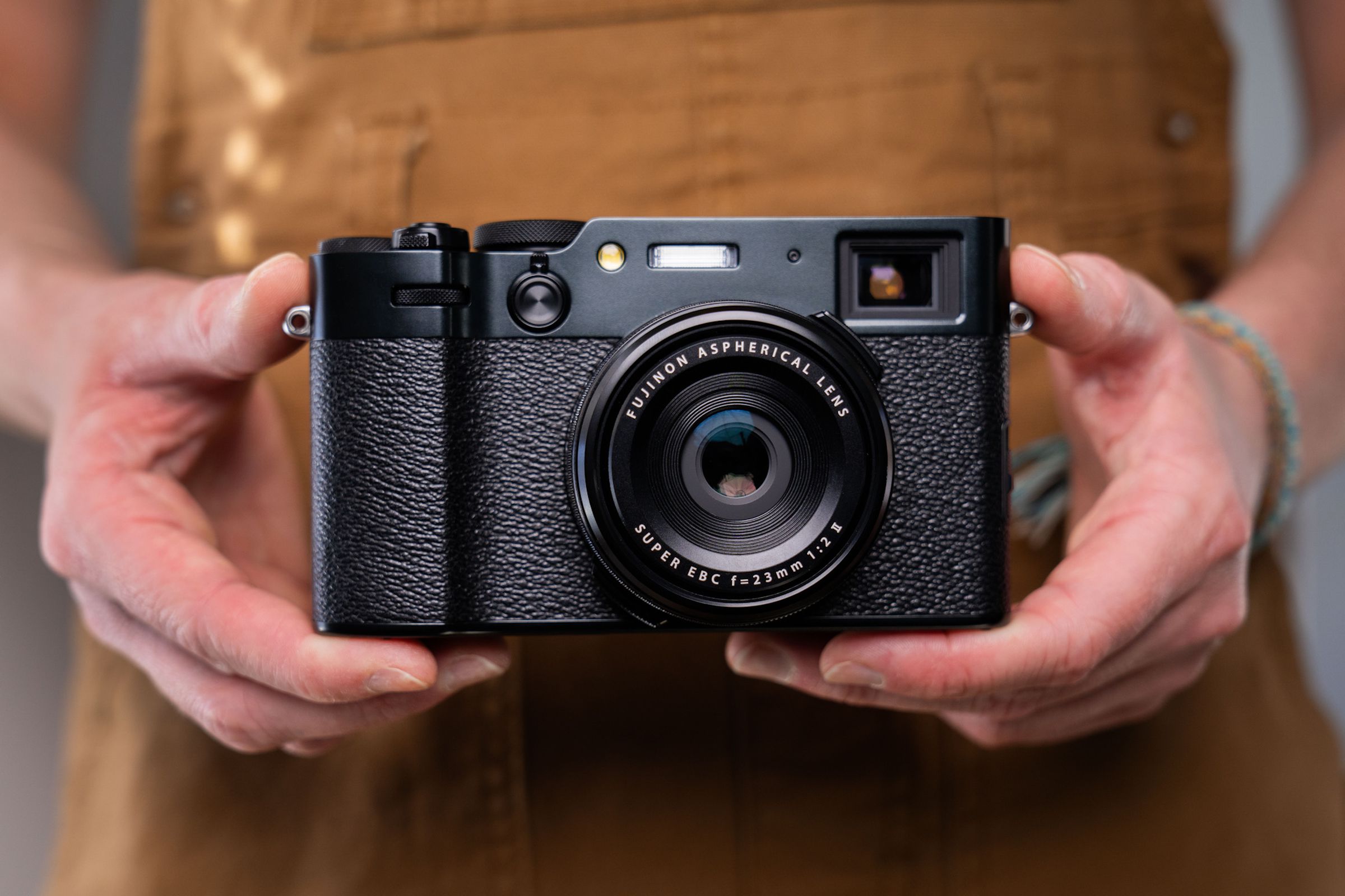 A photo of Fujifilm’s X100VI camera held in someone’s hands.