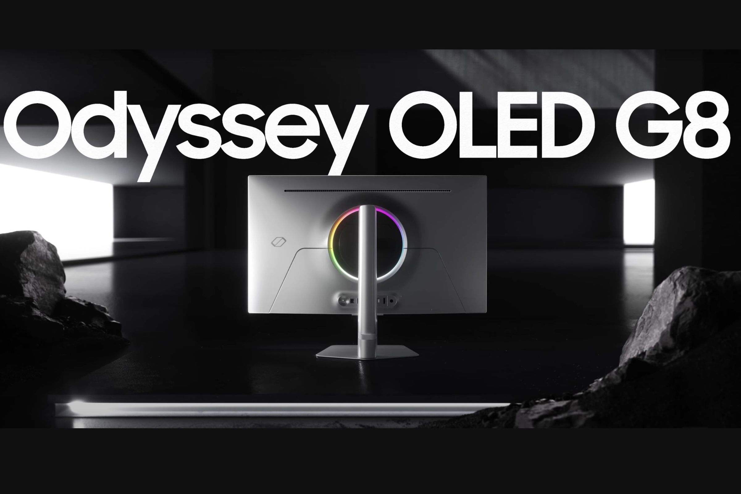 The Samsung Odyssey OLED G8 in a dimly lit room.