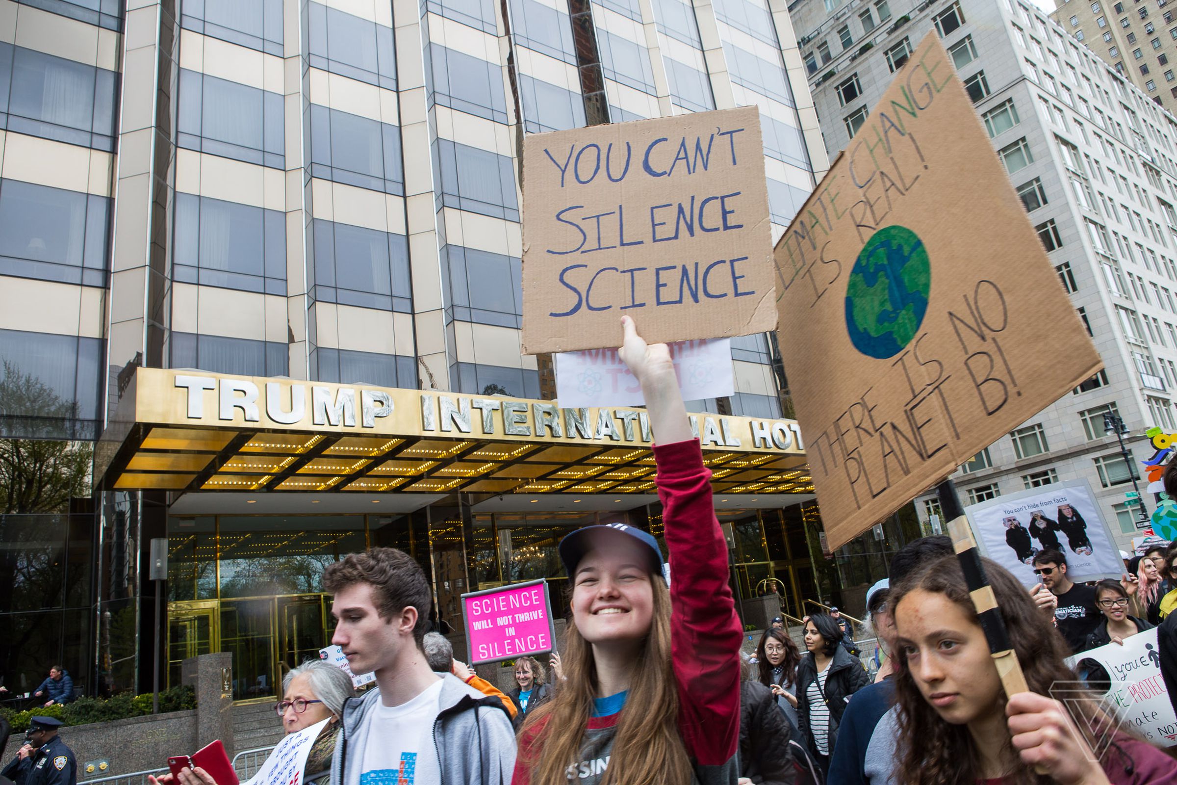 People holding signs at last year’s March for Science.