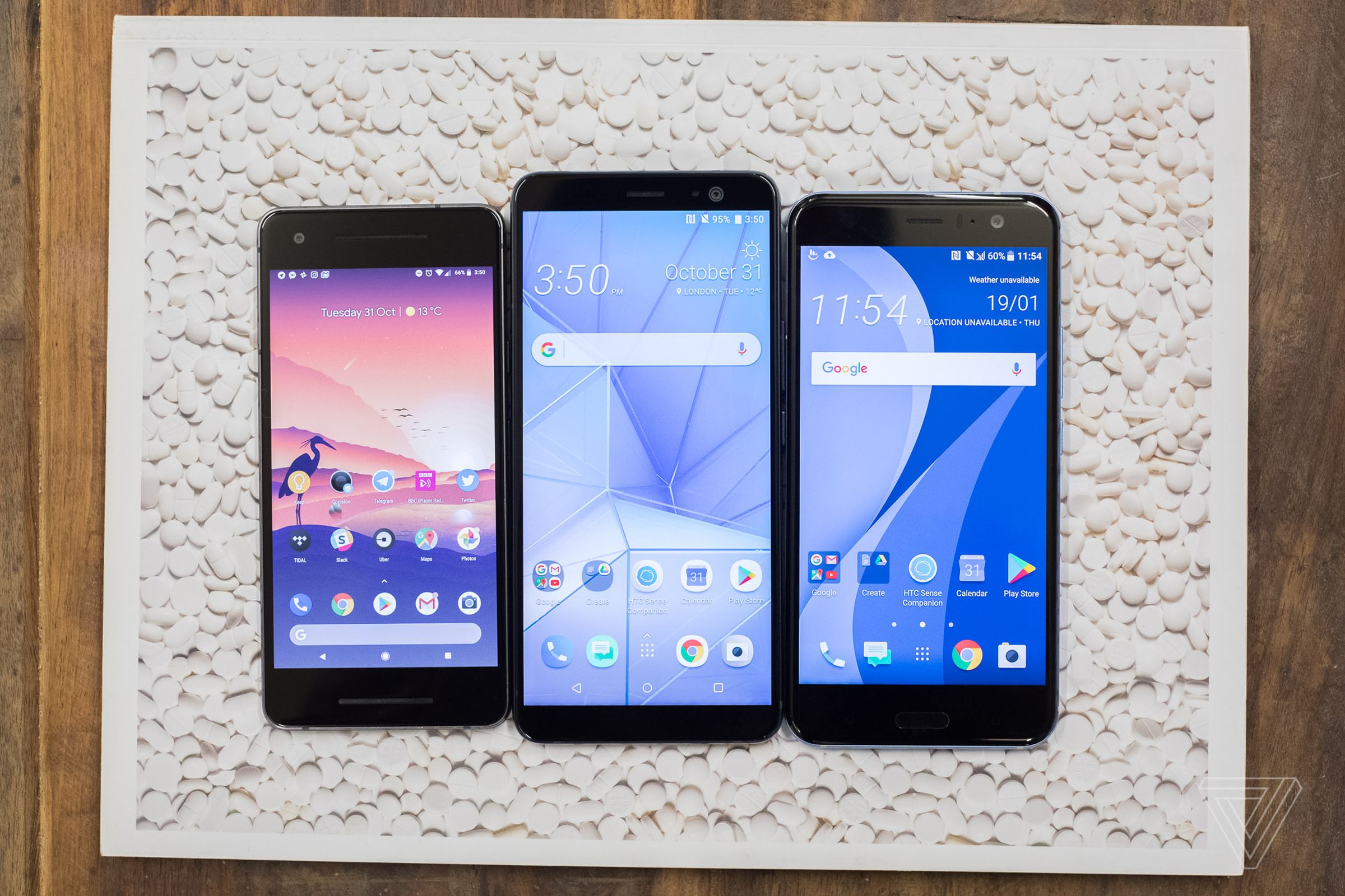 Google Pixel 2 next to HTC U11 Plus and U11