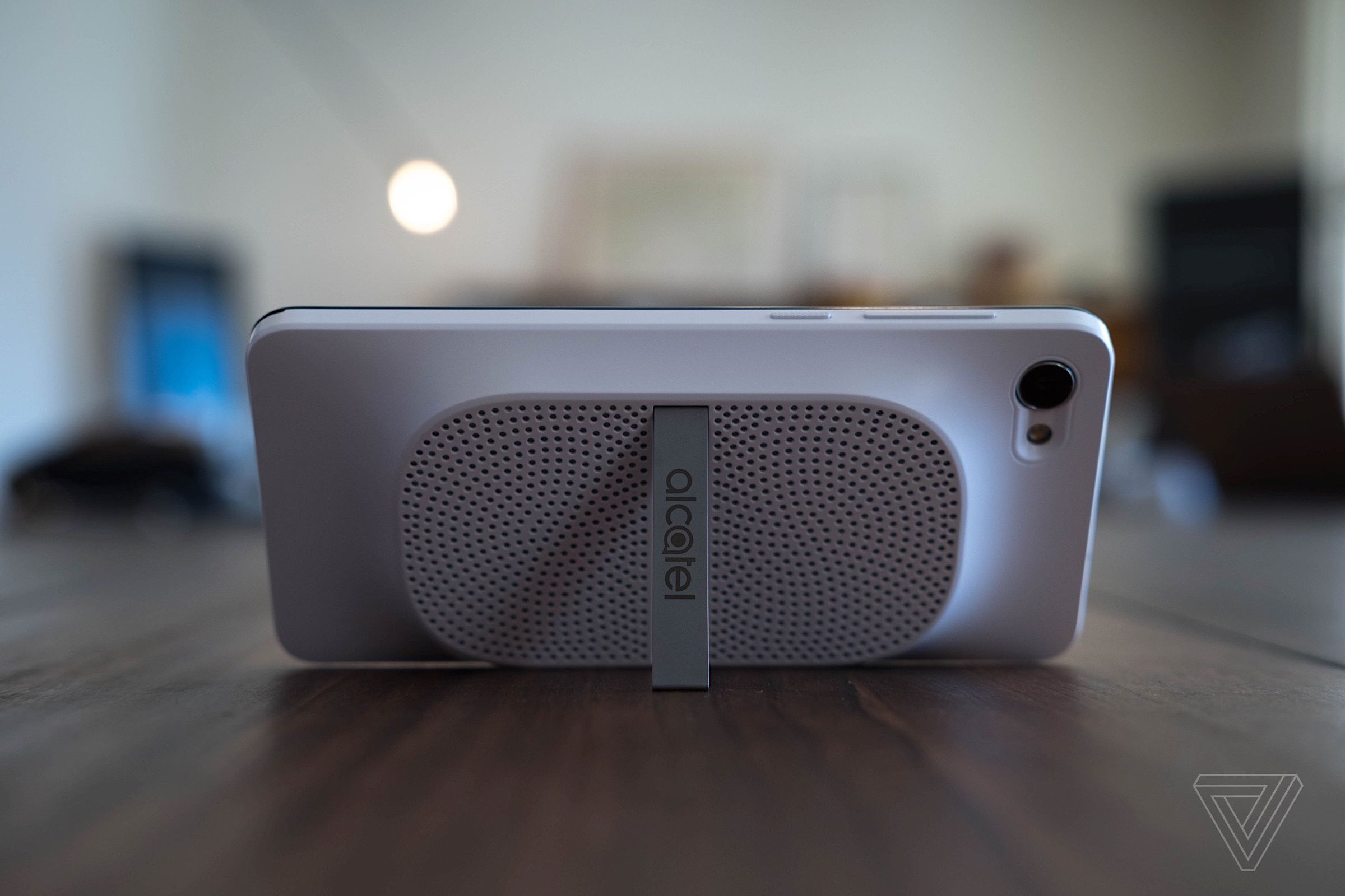 The A5 with a prototype clip-on speaker case.