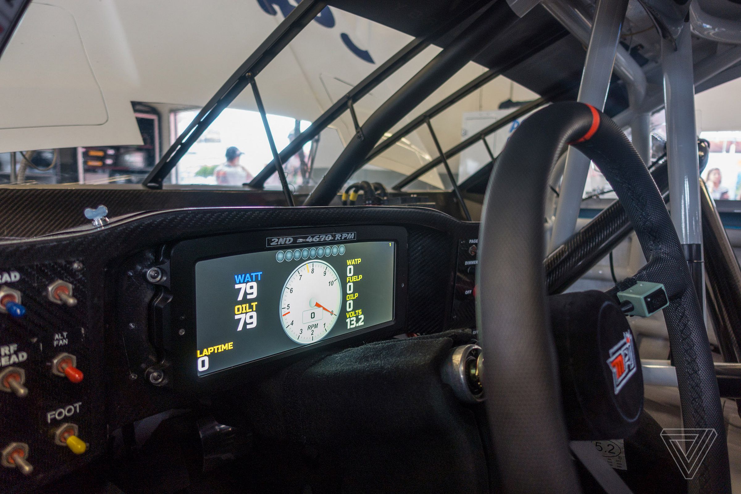 NASCAR’s new Race Management app (above) and the new digital dashboard (below) seen on the 37 car of Chris Buescher.