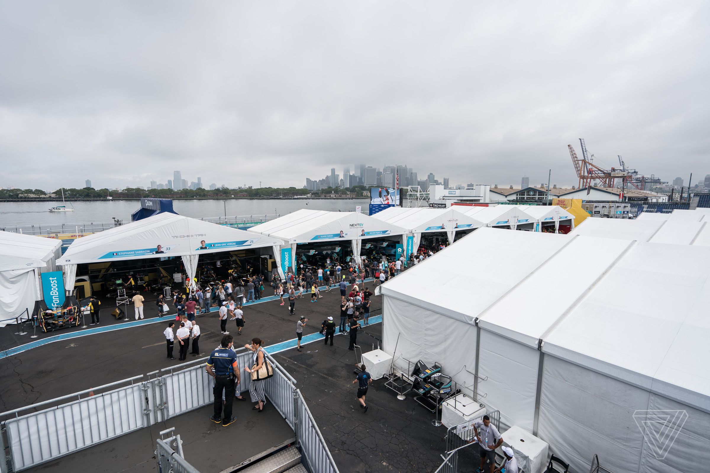 A view of the pit area, or “paddock,” with the southern tip of Manhattan shrouded in clouds in the background. 