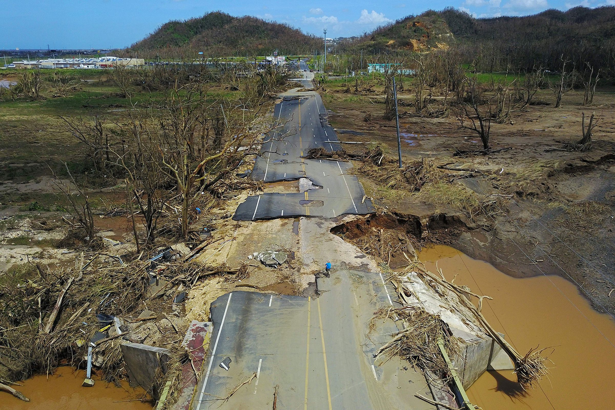 A road in Toa Alta, Puerto Rico that was damaged by Hurricane Maria. 