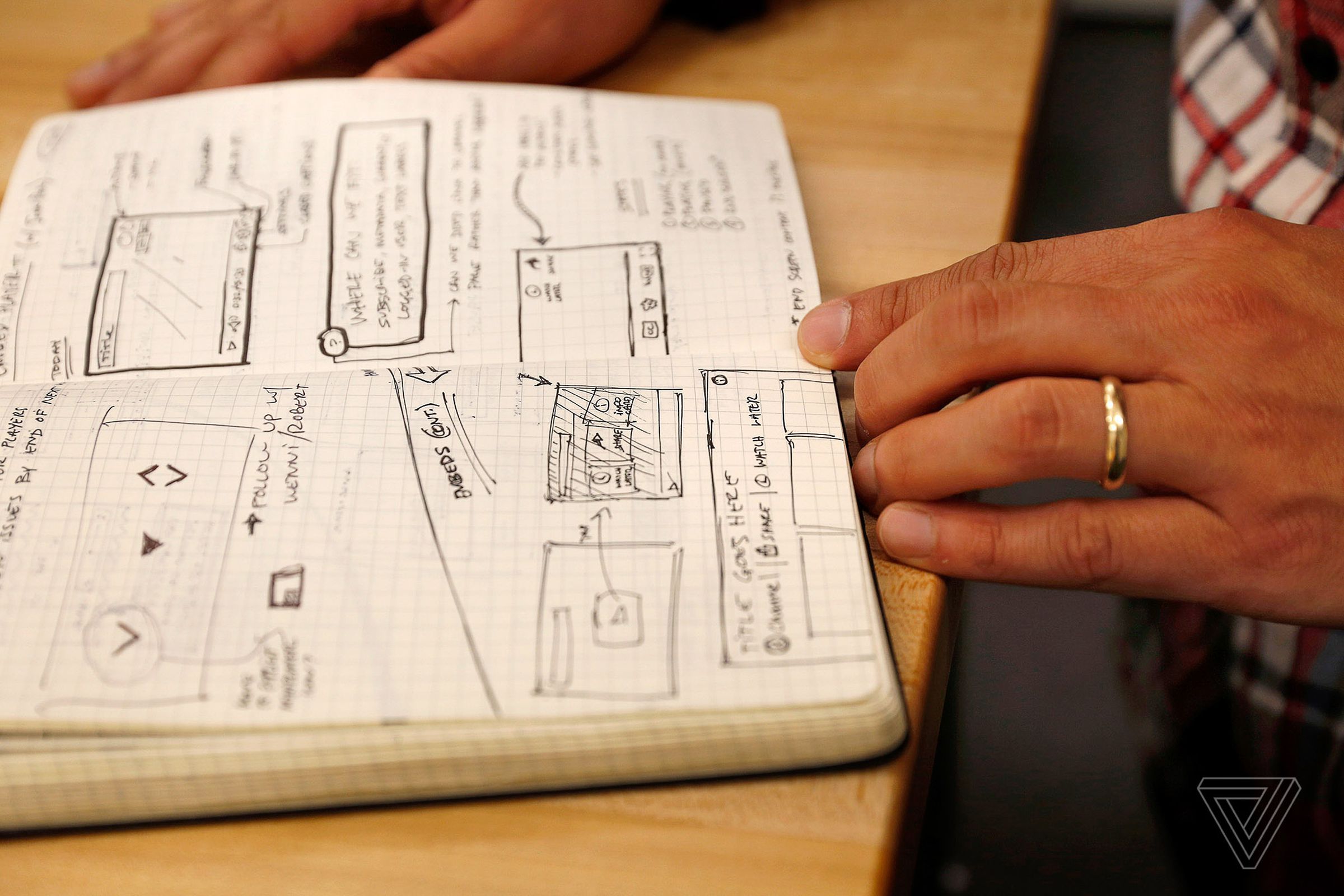 Robert Thompson, a lead designer at YouTube, shows off a notebook of ideas.